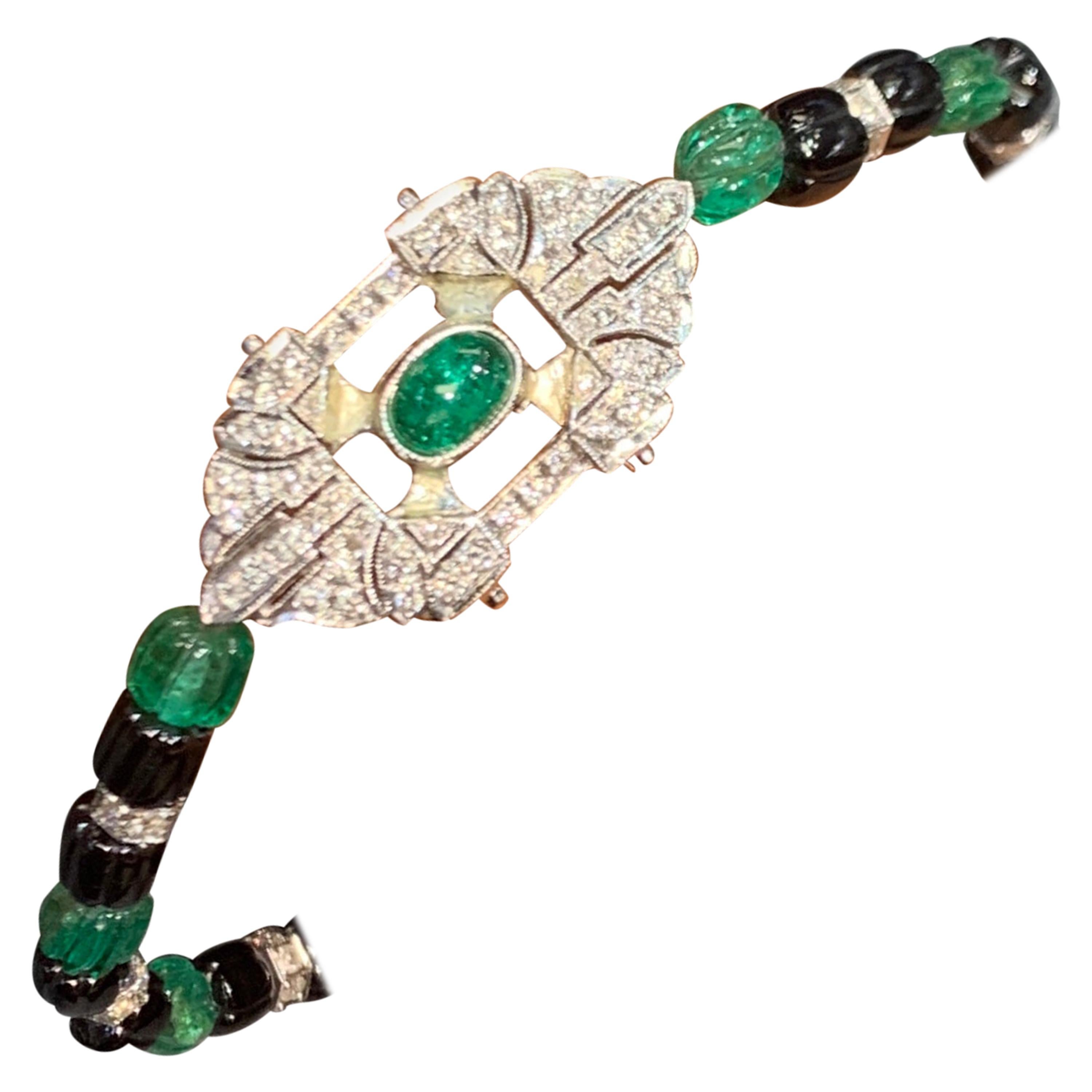 Carved Emerald and Diamond Art Deco Bracelet For Sale