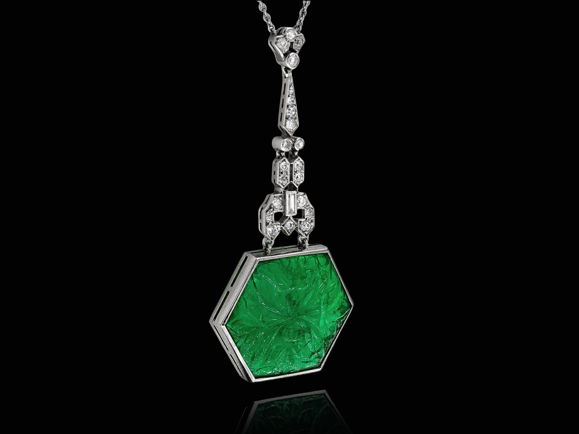 Hexagon Cut Carved emerald and diamond pendant, circa 1925. For Sale