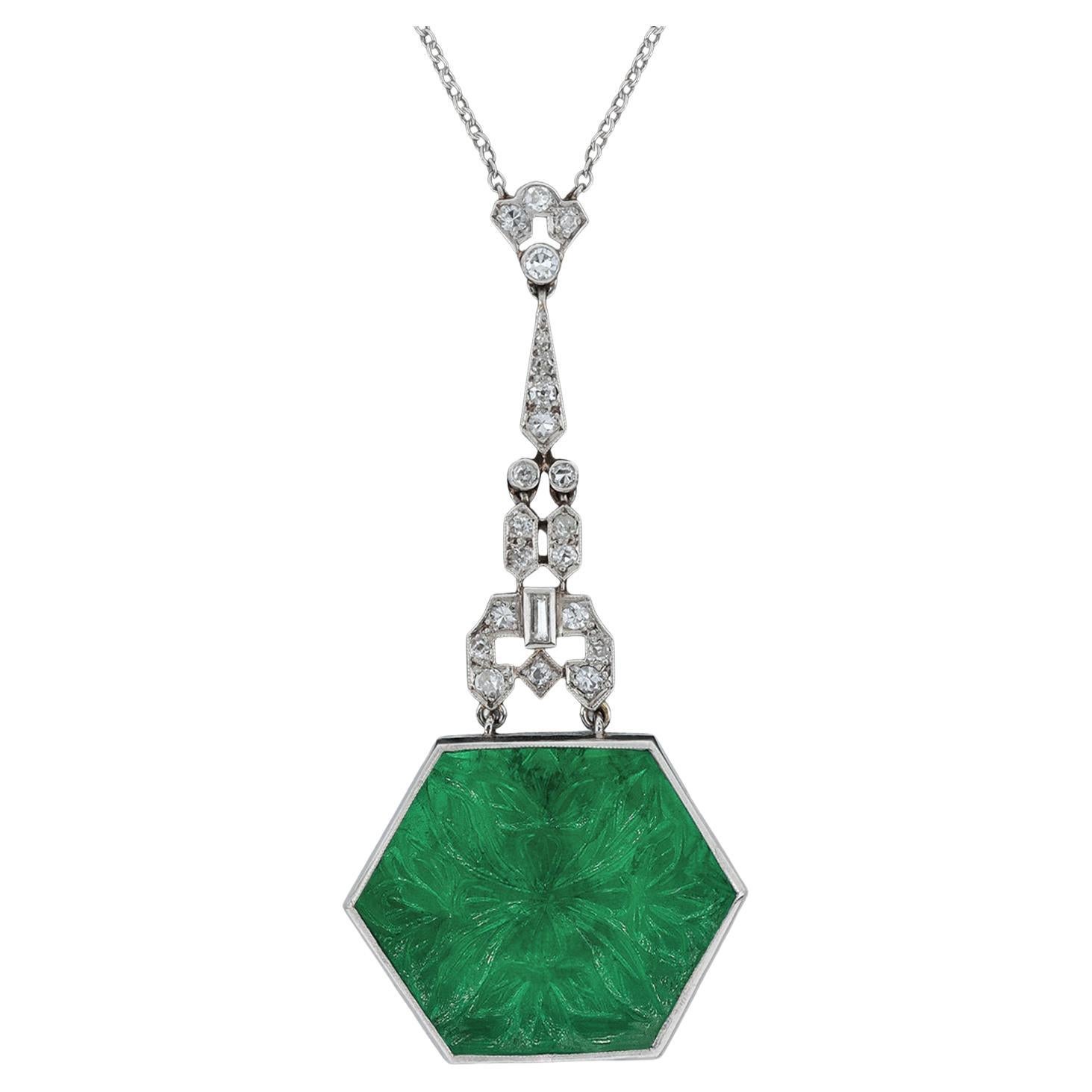 Carved emerald and diamond pendant, circa 1925. For Sale