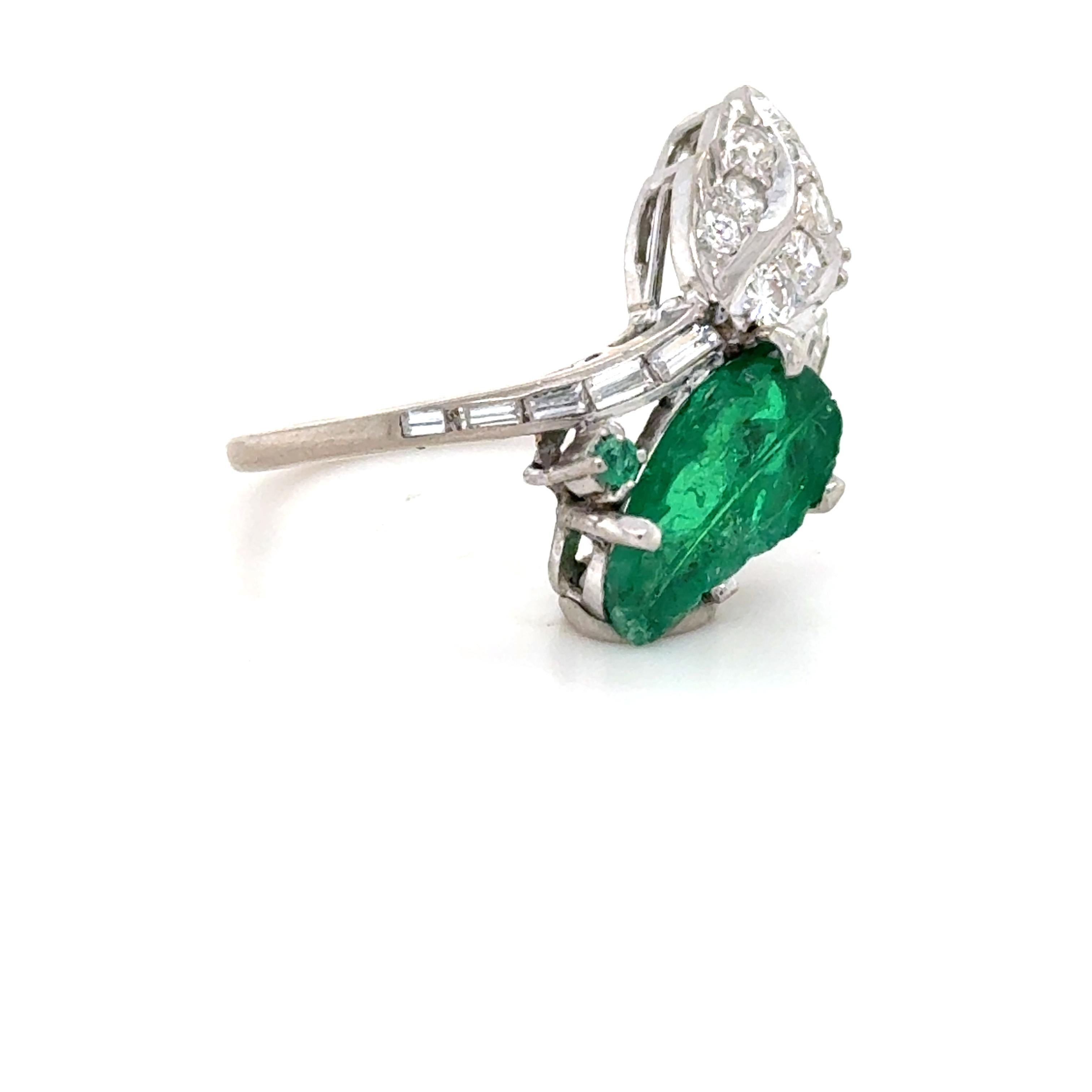 Carved Emerald and Diamond Toi et Moi Ring In Good Condition For Sale In Chicago, IL