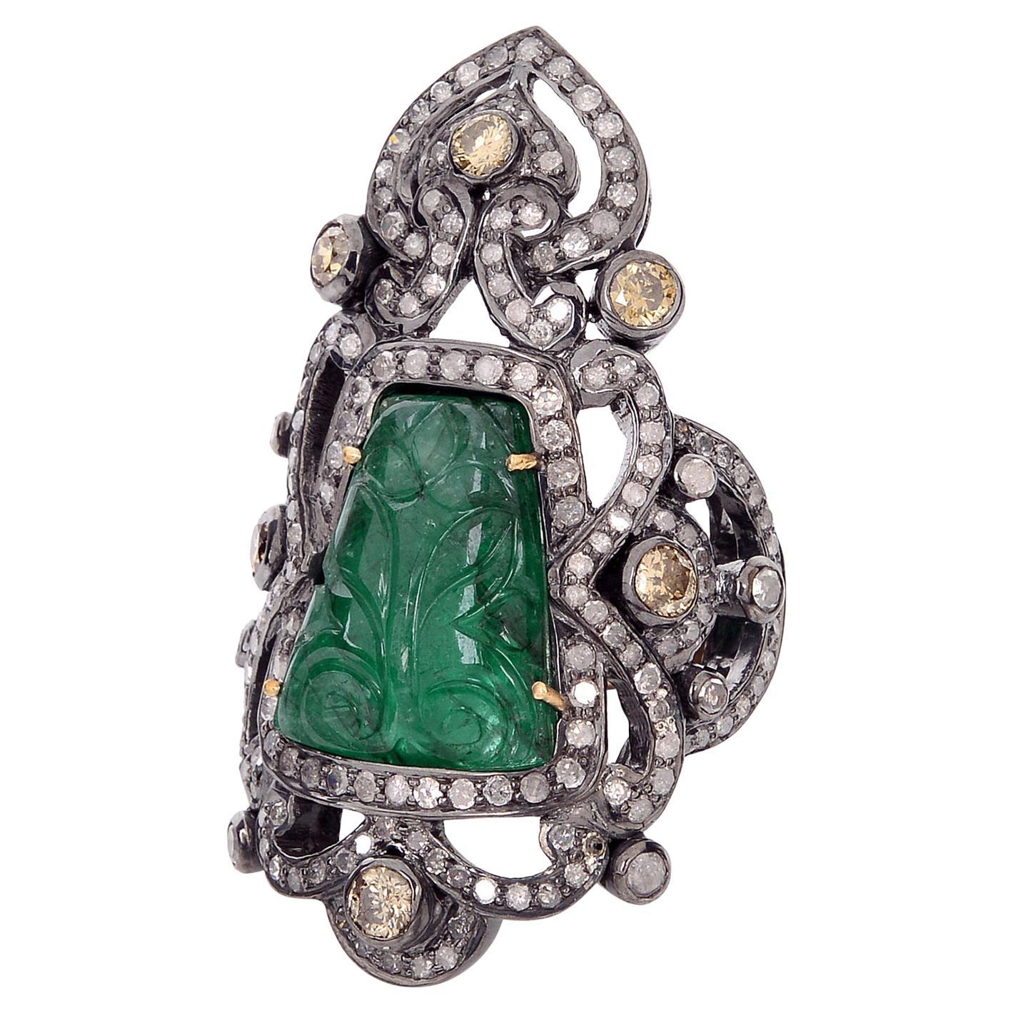 Carved Emerald Knuckle Ring With Ice
Pave Diamonds In 18k Gold
Silver