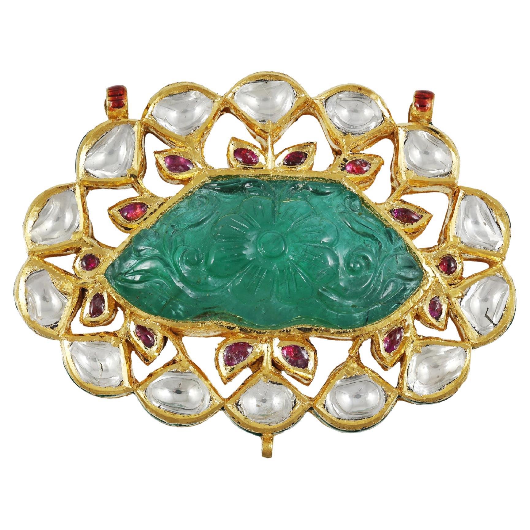 Carved Emerald Maharaja Mughal pendant with diamond polki and rubies in 22K gold