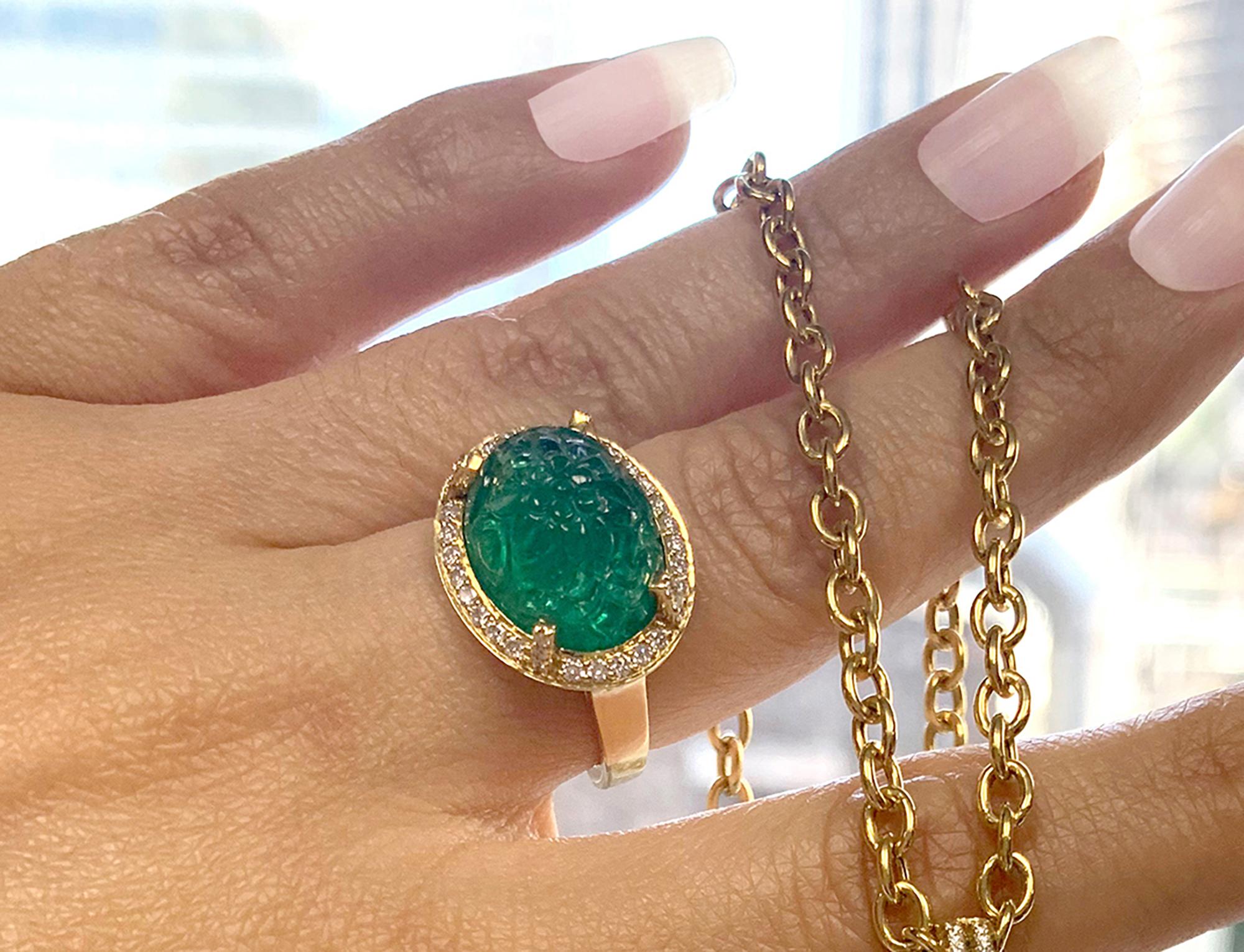 Carved Emerald Ring with Diamonds in 18K Yellow Gold, from 'G-One' Collection 

Stone Size: 15 x 11 mm 

Approx. Wt: 10.74 Carats (Emerald)

Diamonds: G-H / VS, Approx. Wt: 0.32 Carats

