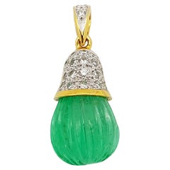 Carved Emerald with Diamond Pendant Set in 18 Karat Gold Settings