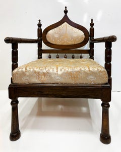 Carved End of Indo-British Colonial Period Lounge Chairs, Pair