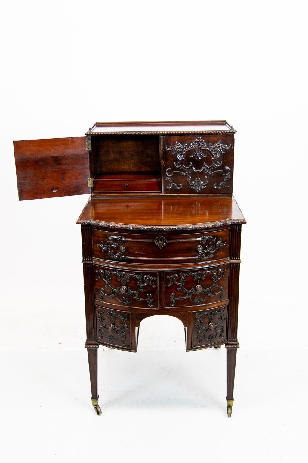 Early 19th Century Carved English Mahogany Hepplewhite Bow Front Desk On Legs