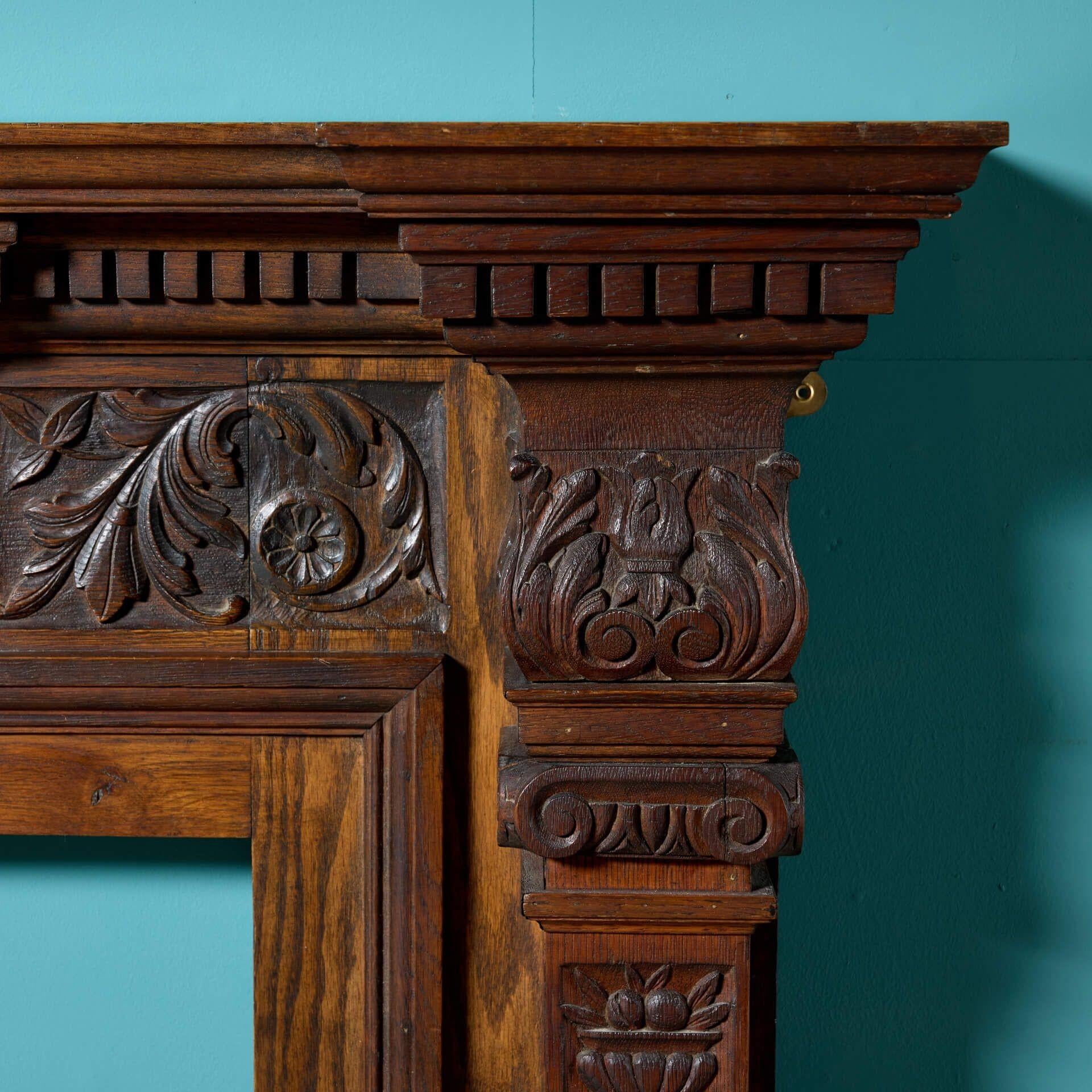 20th Century Carved English Oak Jacobean Style Fire Mantel