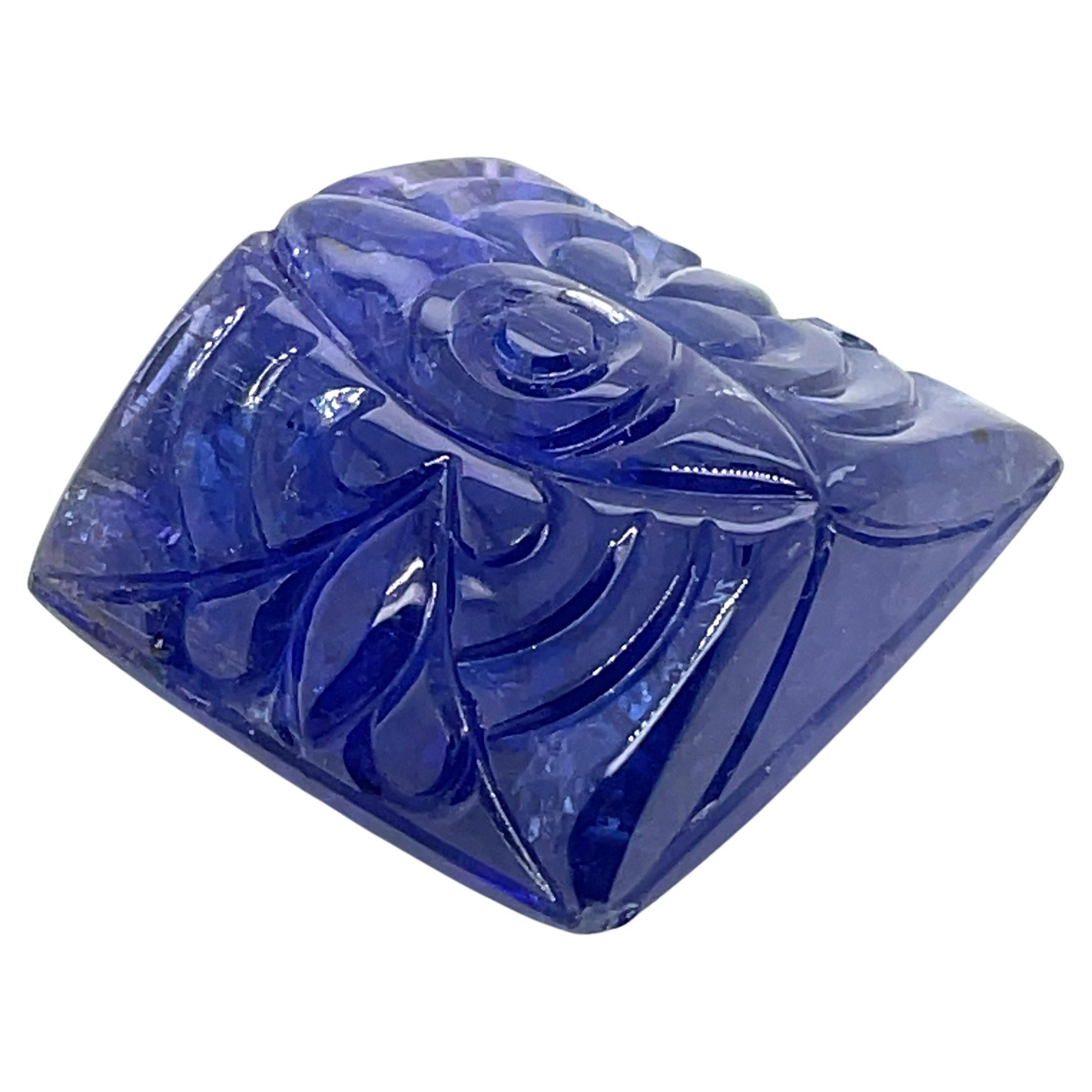 With an eye carved into the center of the stone, it seems to hold secrets of its own. 

This 79.71-carat carved eye tanzanite is a captivating work of art that begs to be explored.

Tanzanite itself has deep symbolic meaning; it stands for mental