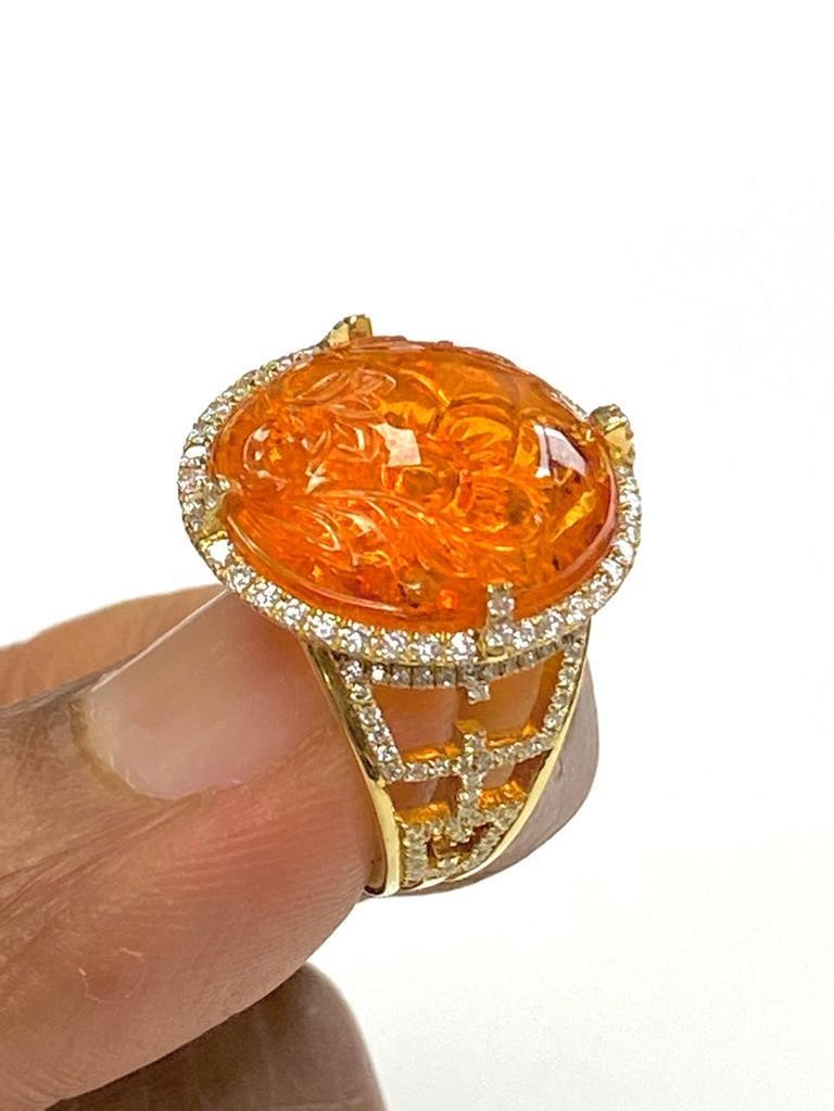 Goshwara Carved Fattish Oval Mandarin And Diamond Ring For Sale