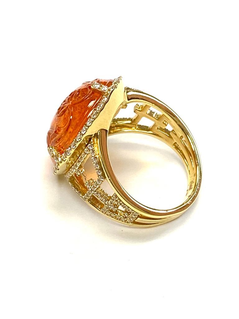 Goshwara Carved Fattish Oval Mandarin And Diamond Ring For Sale
