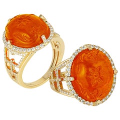 Goshwara Carved Fattish Oval Mandarin Garnet And Diamond Ring