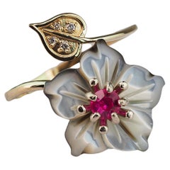 Carved Flower 14k ring with gemstones.