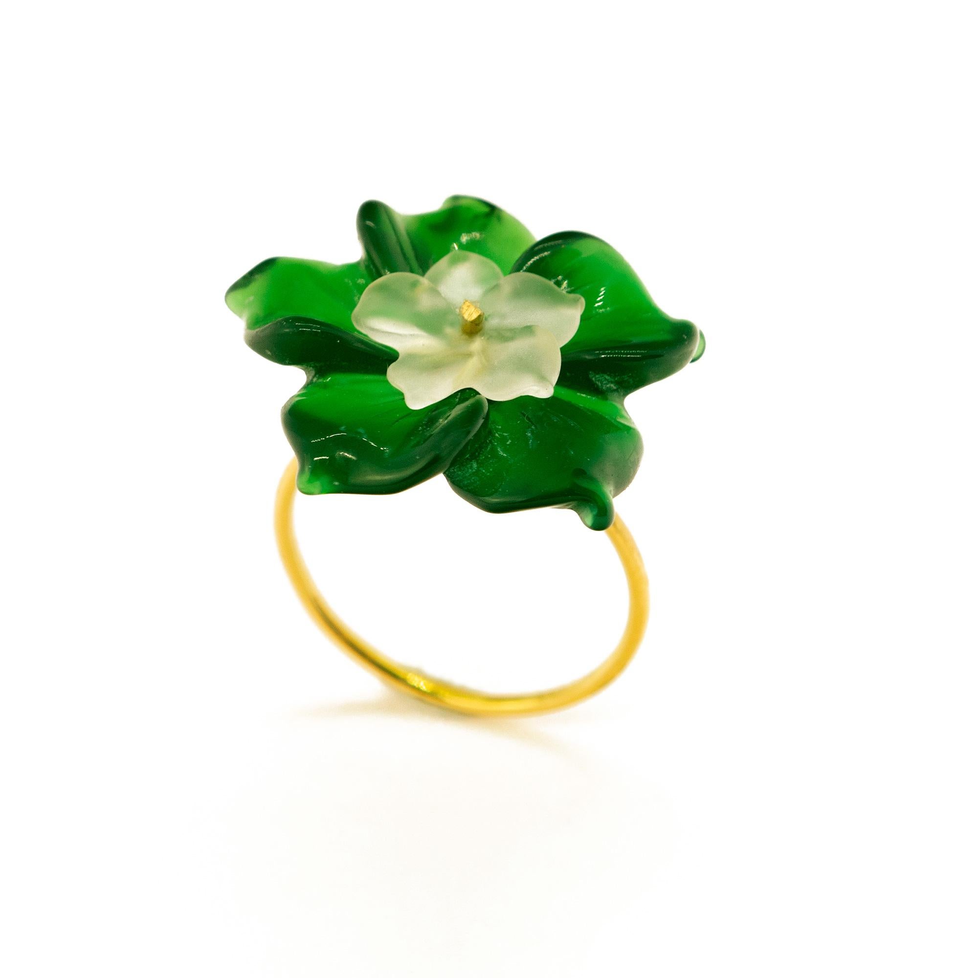Carved petals evocative of the Italian handmade traditional jewelry work, wrapping itself in a soft look enriched with 18 karat yellow gold manifesting glamour and exquisite taste. Spring look. 

Go Floral for Spring with a unique handmade Fashion
