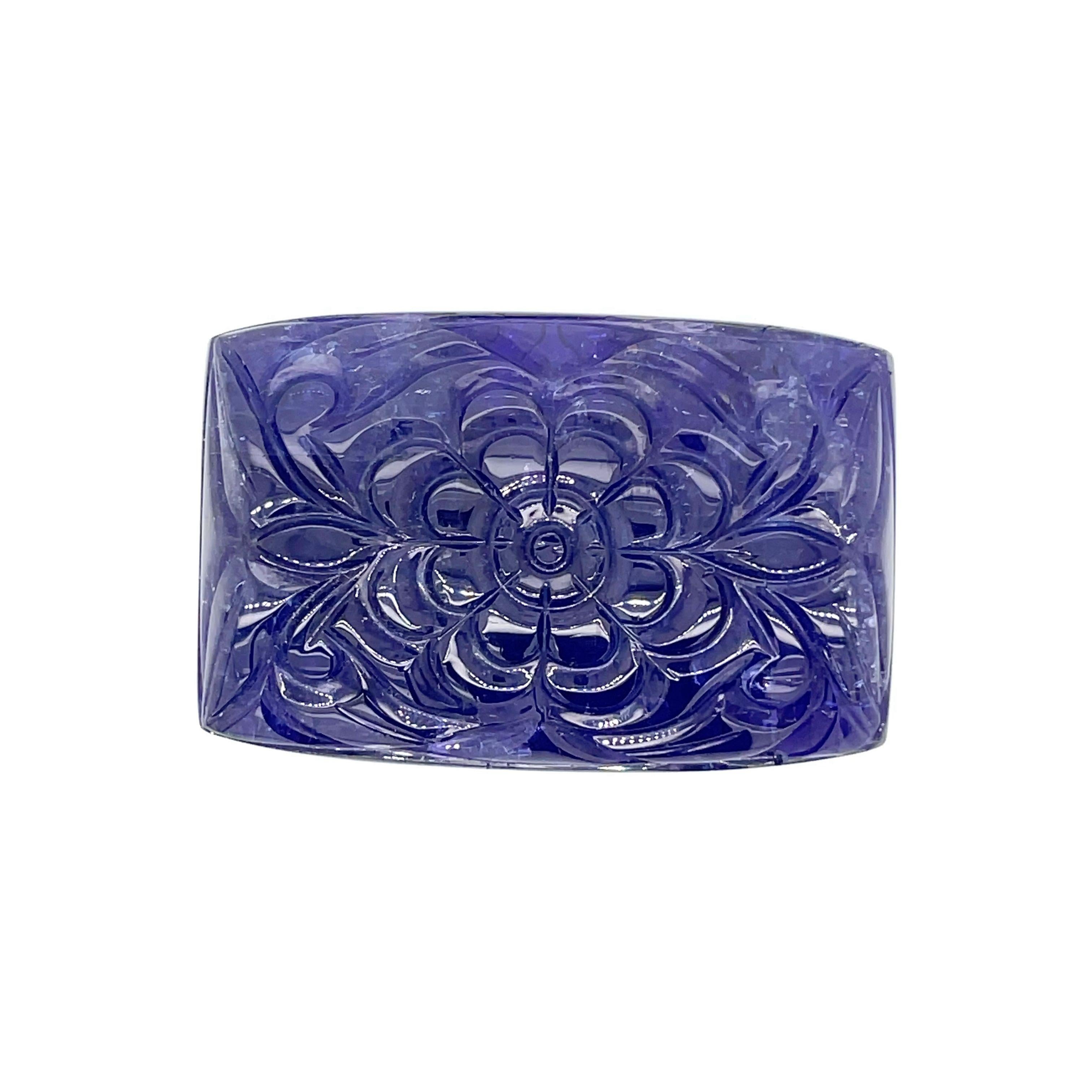 Contemporary Carved Flower Rectangular Tanzanite Cts 176.08 For Sale