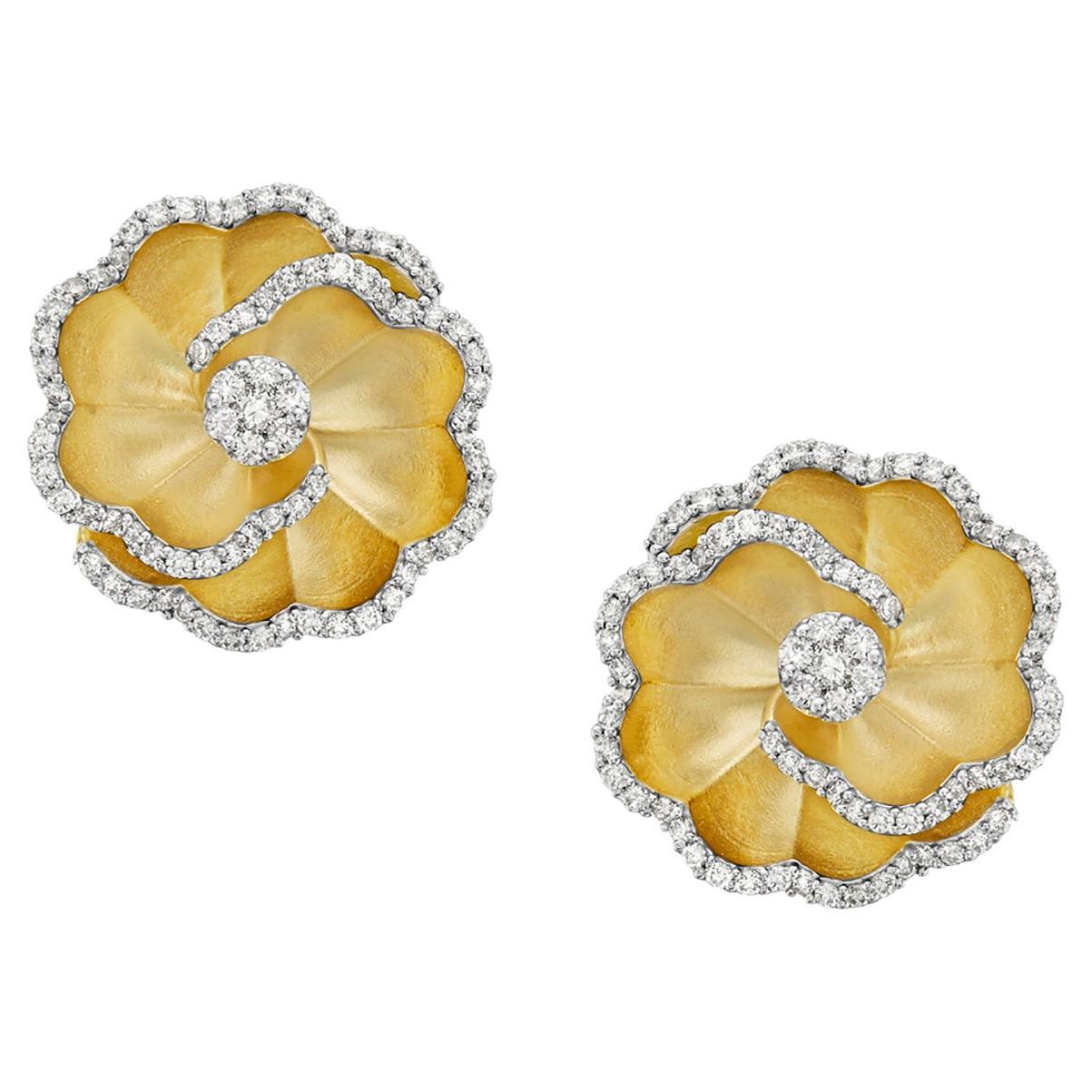 Carved Flower Shaped Earrings Accented with Diamonds Made in 14k Yellow Gold For Sale