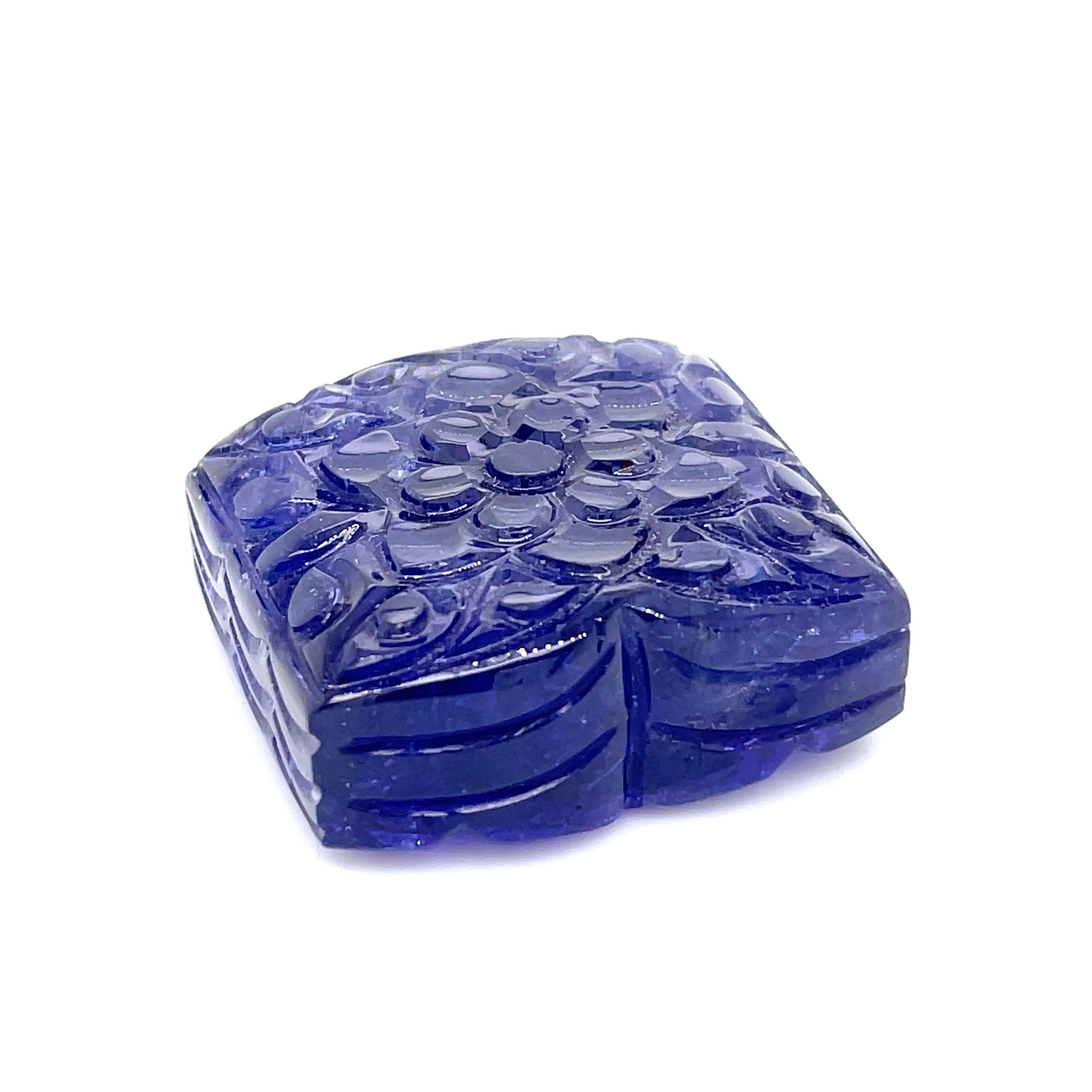 Contemporary Carved Flower Tanzanite Cts 128.94 For Sale
