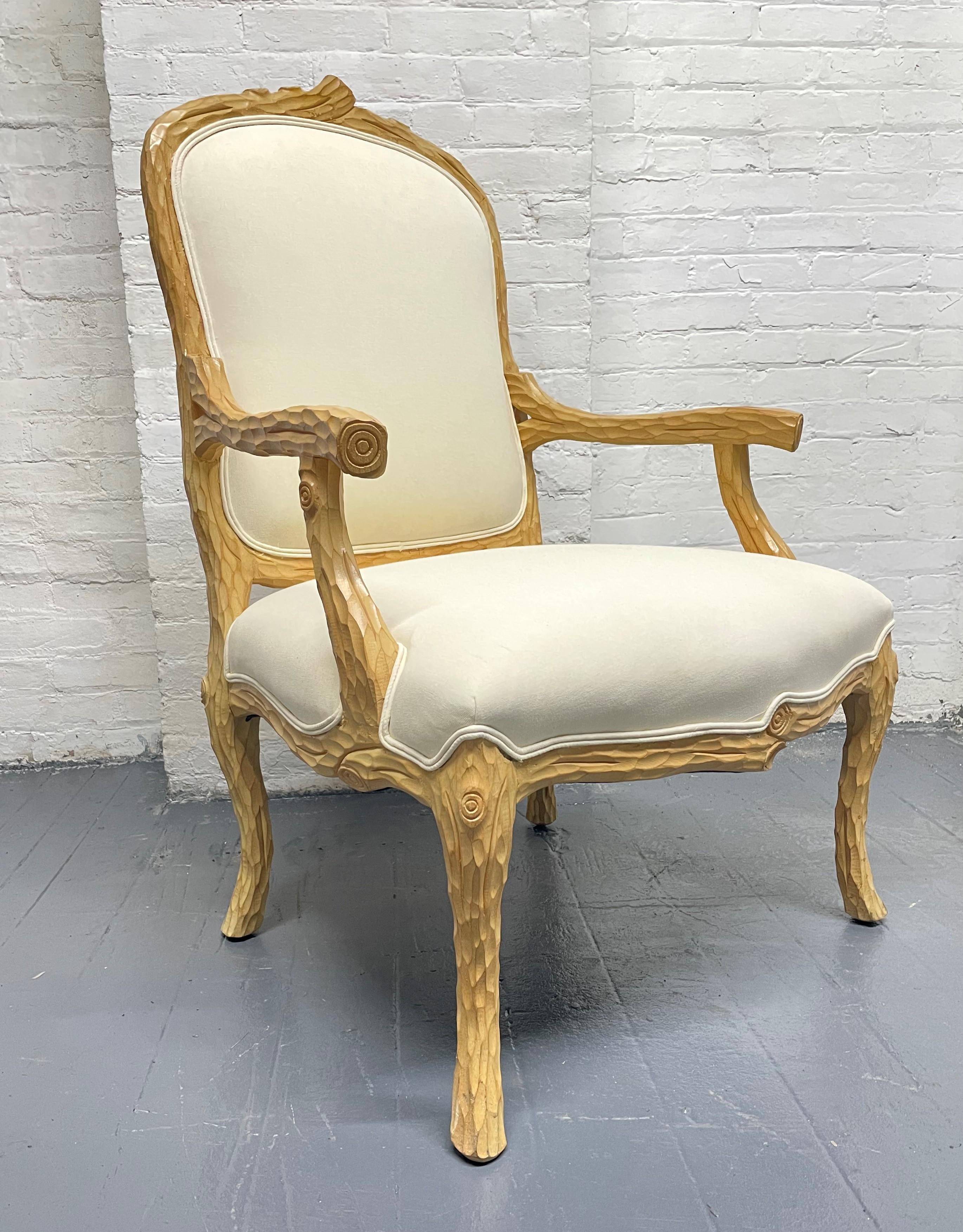 Carved French country armchair in linen-blend upholstery.