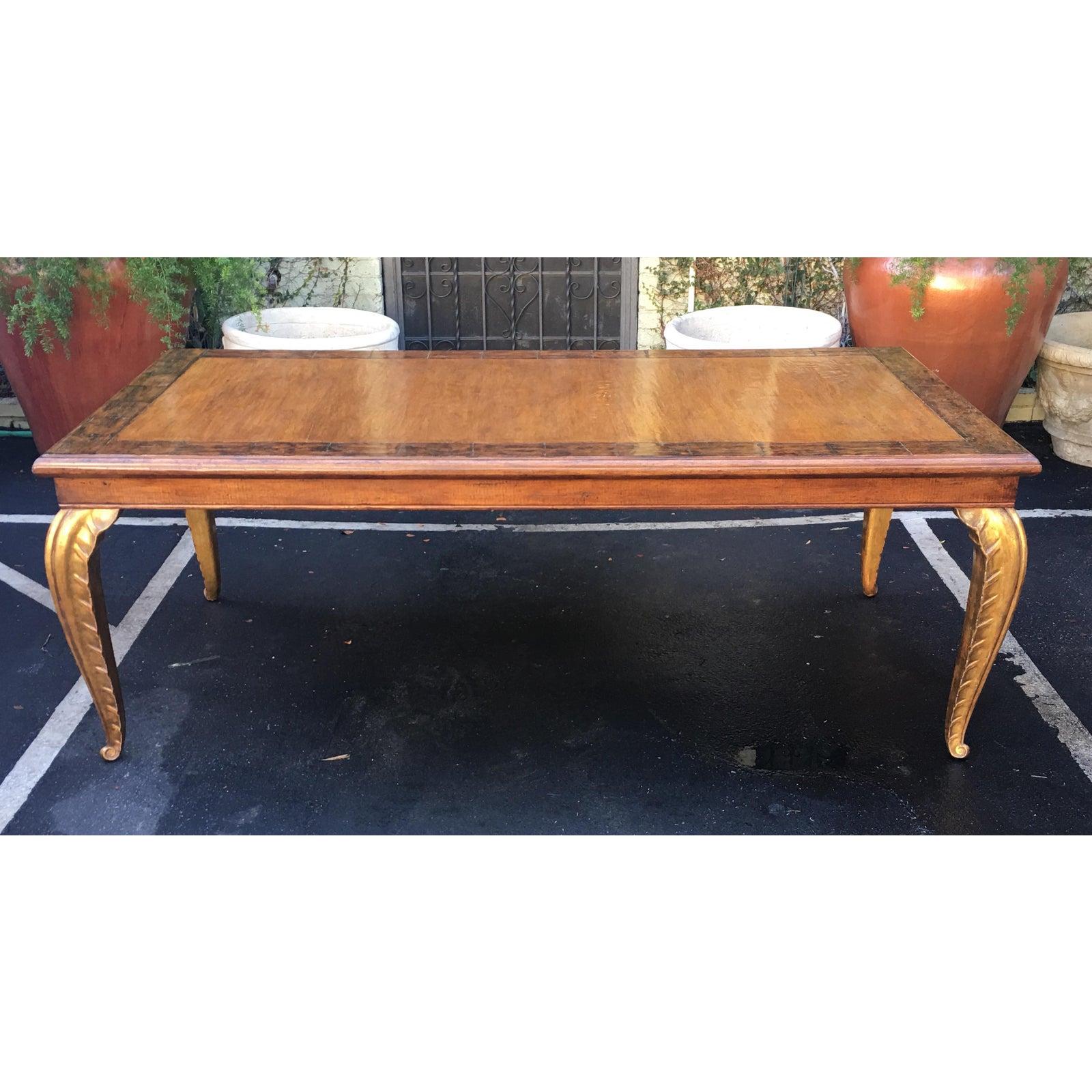 Carved French dining table with giltwood palm leaf legs by Randy Esada.

​Note: Custom orders require a deposit and cannot be canceled.  All custom order deposits are non-refundable.  