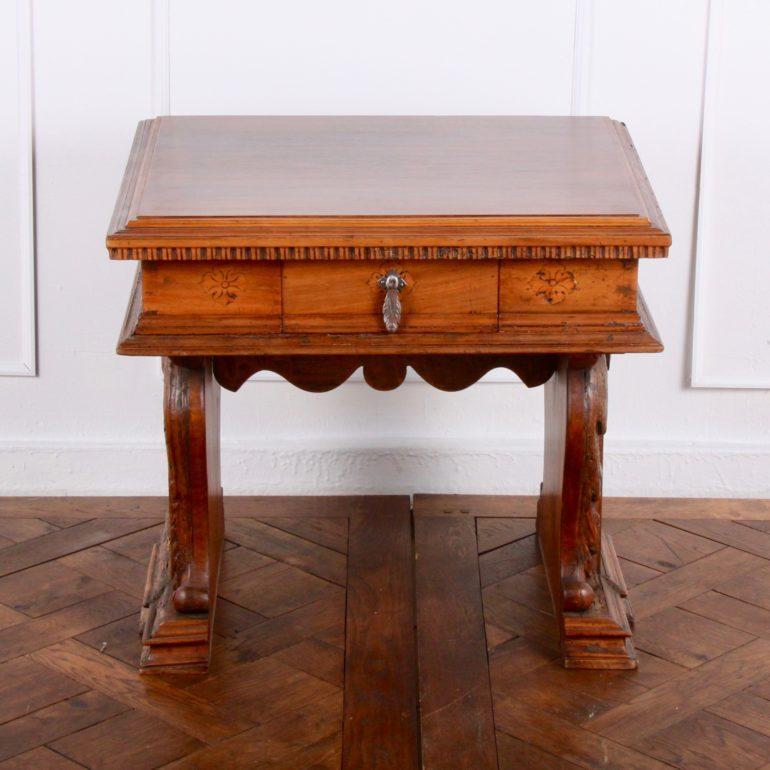 Highly carved side table with single drawer and delicate inlays along the sides, circa 1500. Clearly shown in photographs of the interior of the villa. 

Measures: 26? wide x 23? deep x 23.5? tall.







