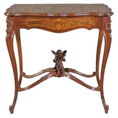 Mesa de salón central francesa tallada Luis XV Puttu con incrustaciones de querubines Attr. RJ Horner