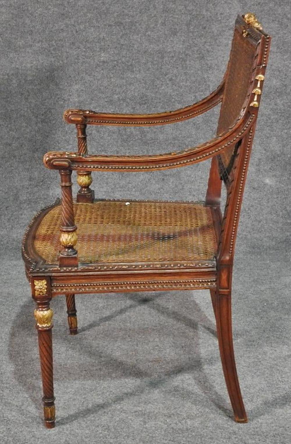 This is a fine 1870s era armchair that really is a statement piece, circa 1870. Fitted with a silk cushion with tassles, this could become your very favorite chair. The chair is in excellent condition and has normal signs of wear and age but nothing