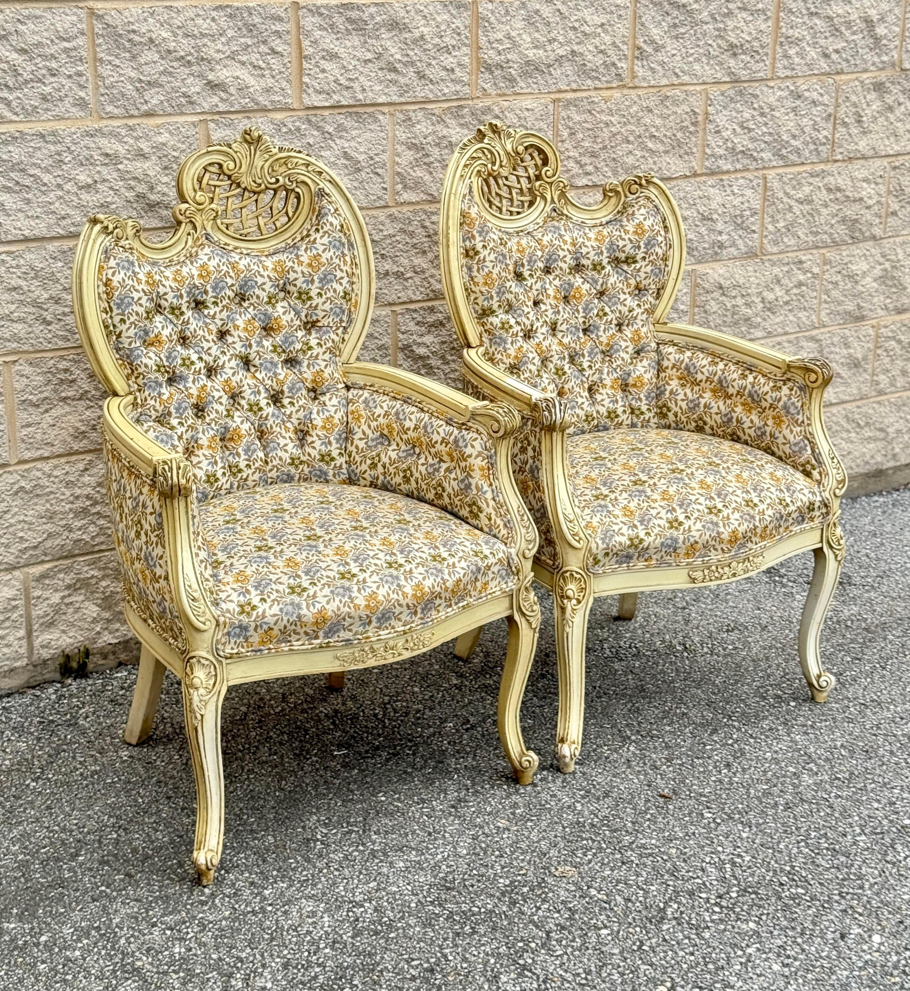 Stunning pair of early 20th-century French Louis XVI style bergère armchairs. Upholstered in a floral fabric.
