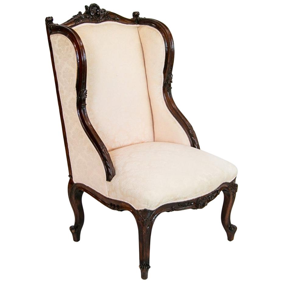 Carved French Slipper Armchair For Sale