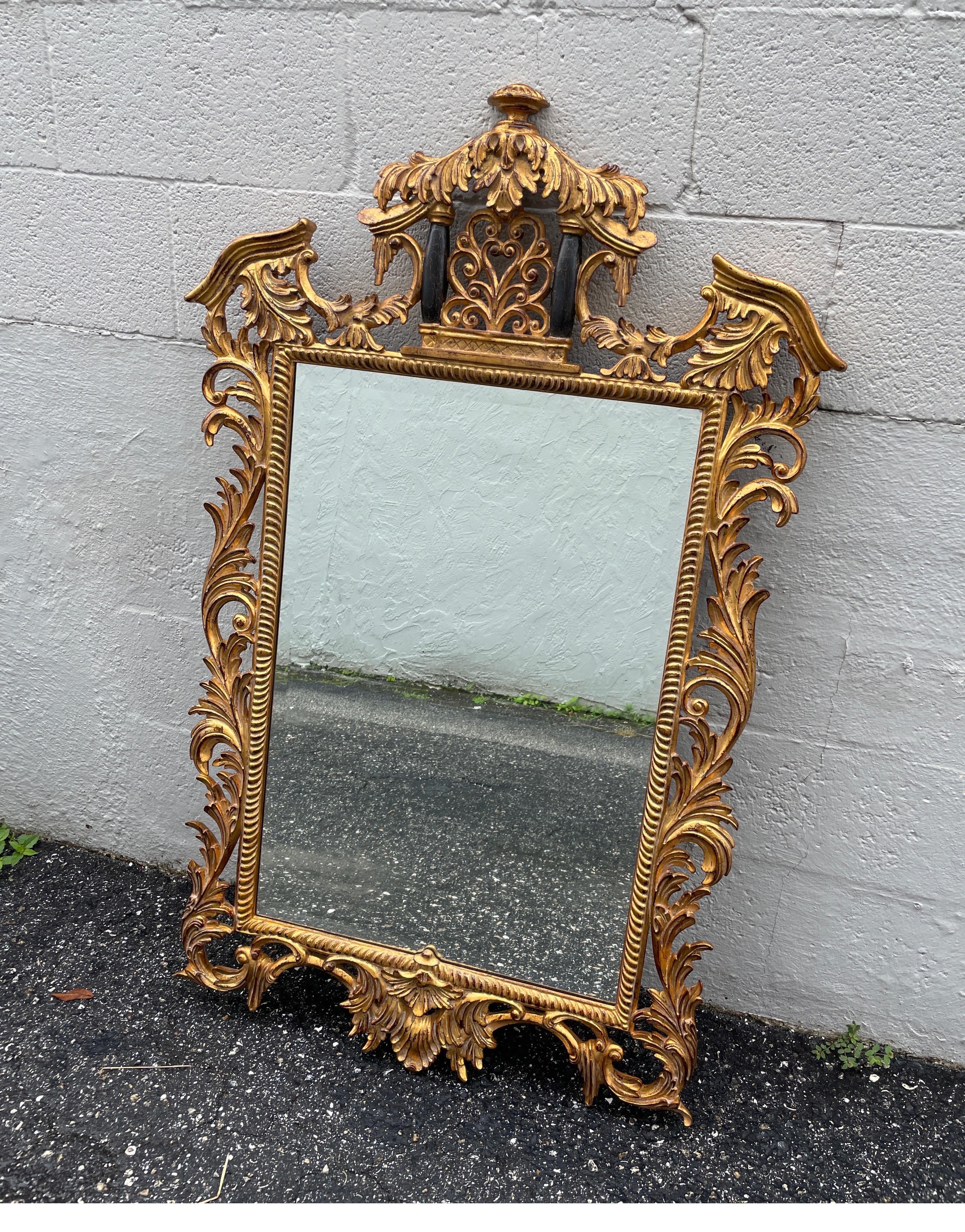 Very detailed carved & gilded Pagoda style mirror by Dauphine.
