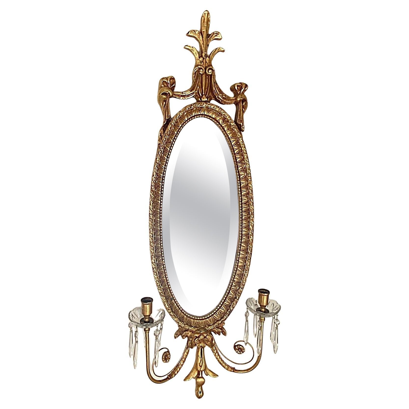 Miroir ovale de style Adams, sculpté et doré, avec chandelles et verre biseauté en vente