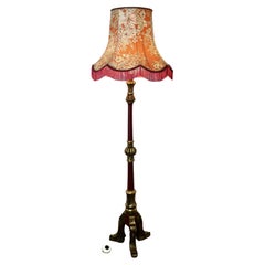 Carved Gilt and Painted Baroque Floor Lamp  This is a very decorative piece