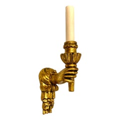 Carved and Giltwood Hand Sconces