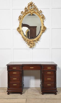 Carved gilt-wood oval wall mirror