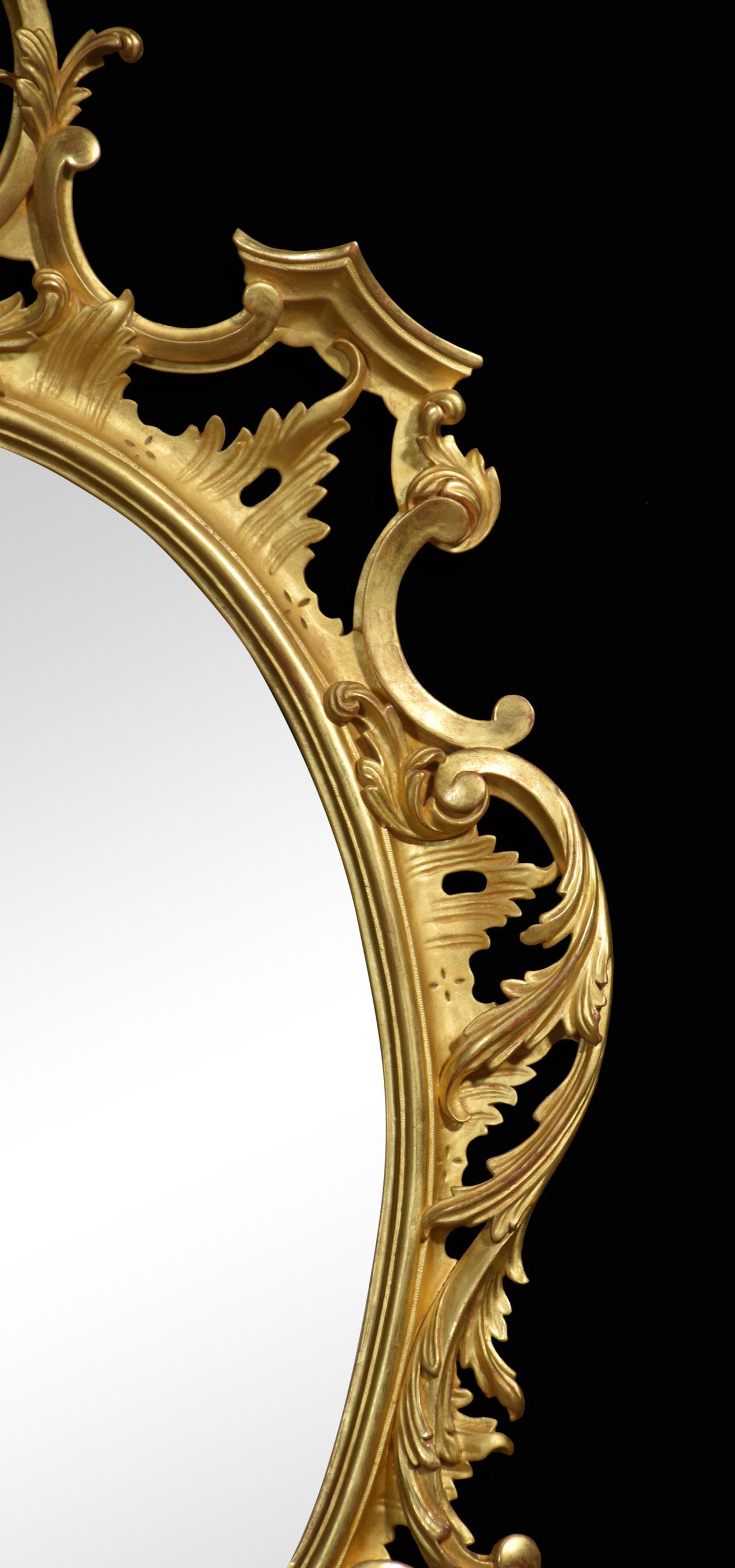 British Carved gilt-wood oval wall mirror For Sale