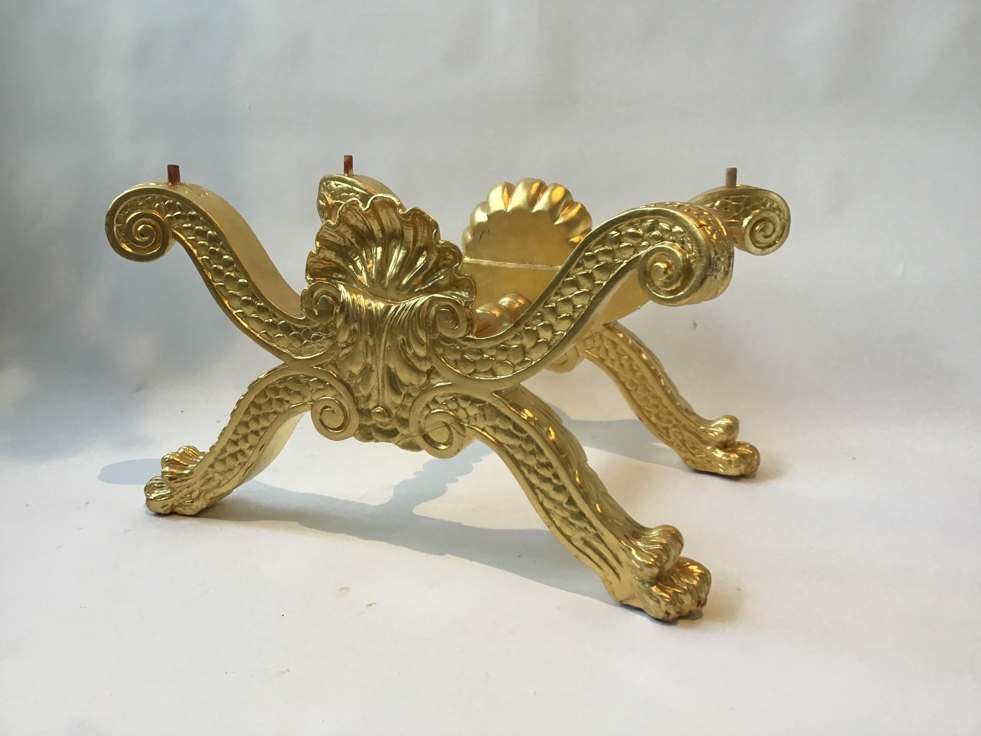 Carved gilt wood Rococo lion paw bench.