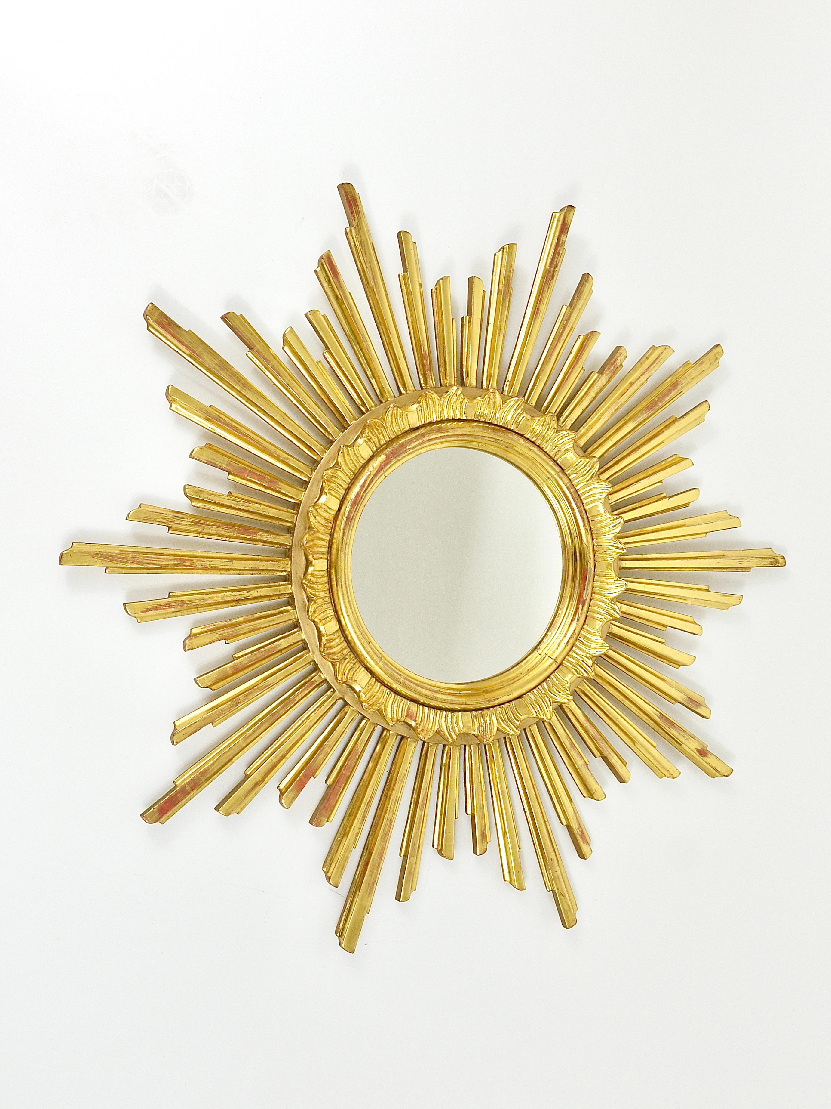 Gold Carved Gilt Wood Sunburst Starburst Wall Mirror, Hollywood Regency, France, 1960 For Sale