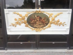 Carved Giltwood and Painted Boiserie Overdoor Frieze Panel with Cherubs Inset