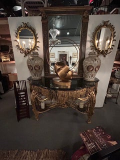 Carved Giltwood Pair of Sconces with Bronze Candle Holders and Mirror