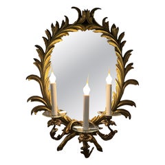 Carved Giltwood Pair of Sconces with Bronze Candle Holders and Mirror