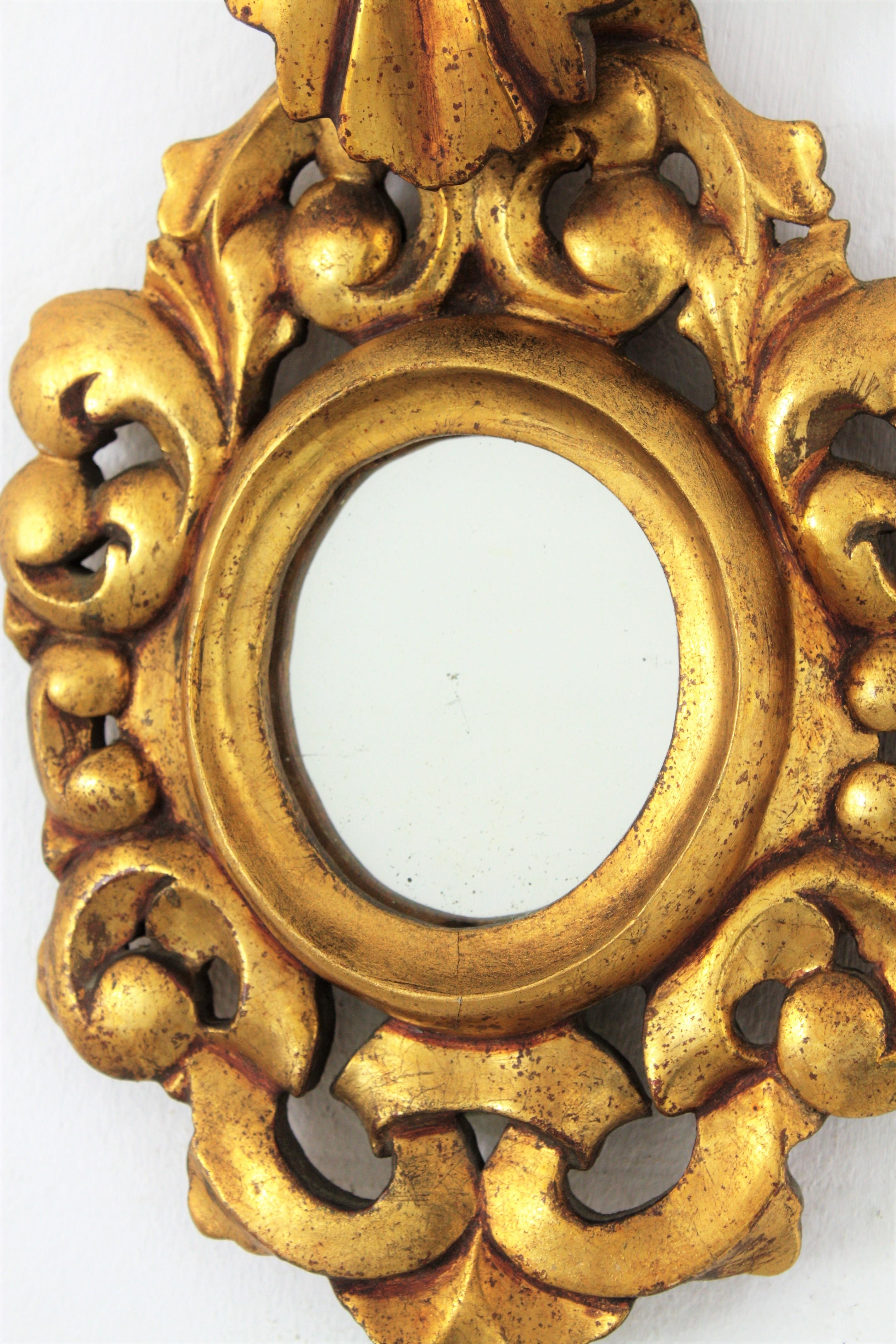 Spanish Carved Giltwood Rococo Style Mini Sized Mirror with Crest, 1940s