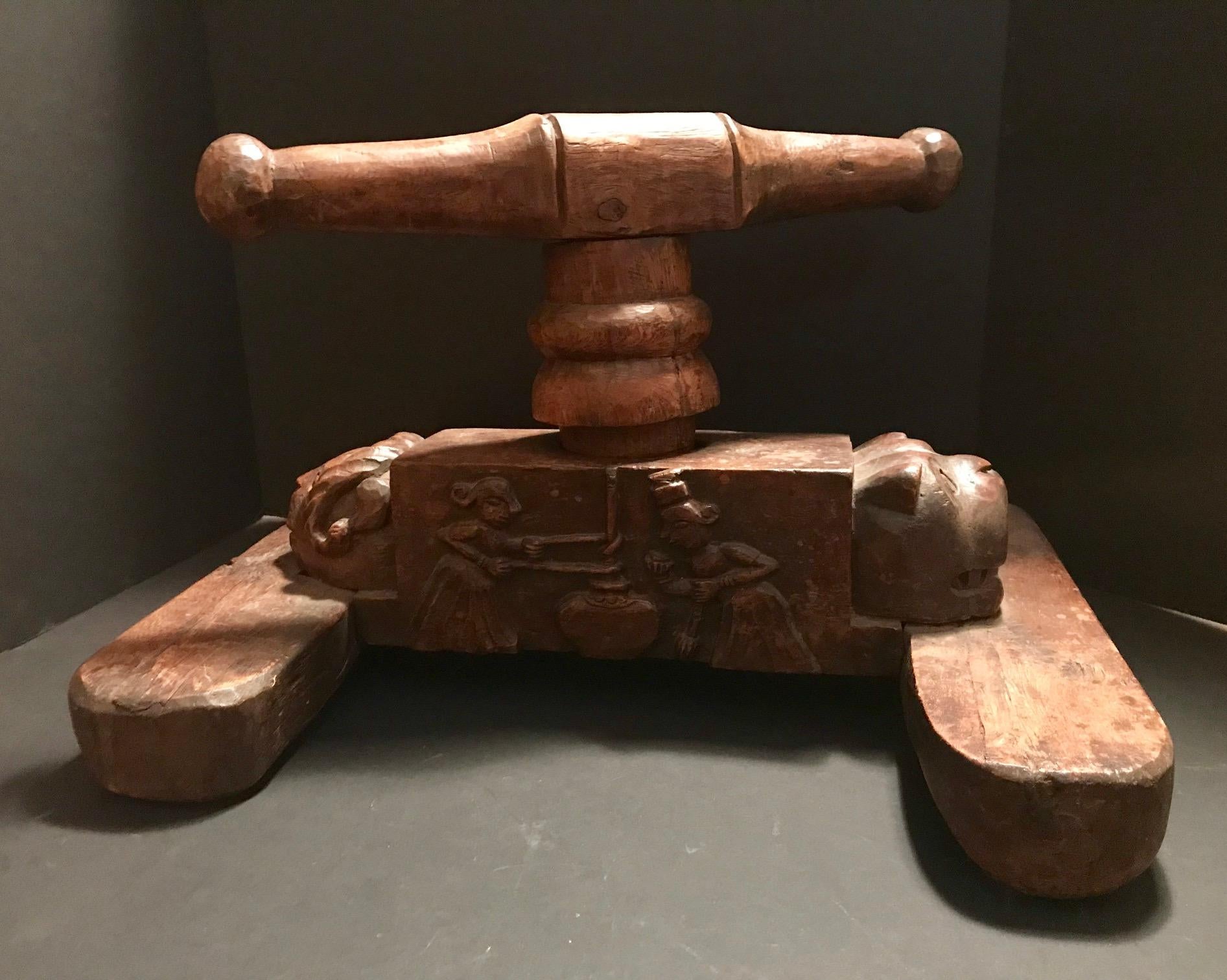 Antique goat cheese press, large Pennsylvania Dutch hand-carved wood Primitive, Folk Art, circa 1800

This rare goat cheese press is American Folk Art. It is created by a peasant craftsman with intricacy. The bas relief carving on the front shows