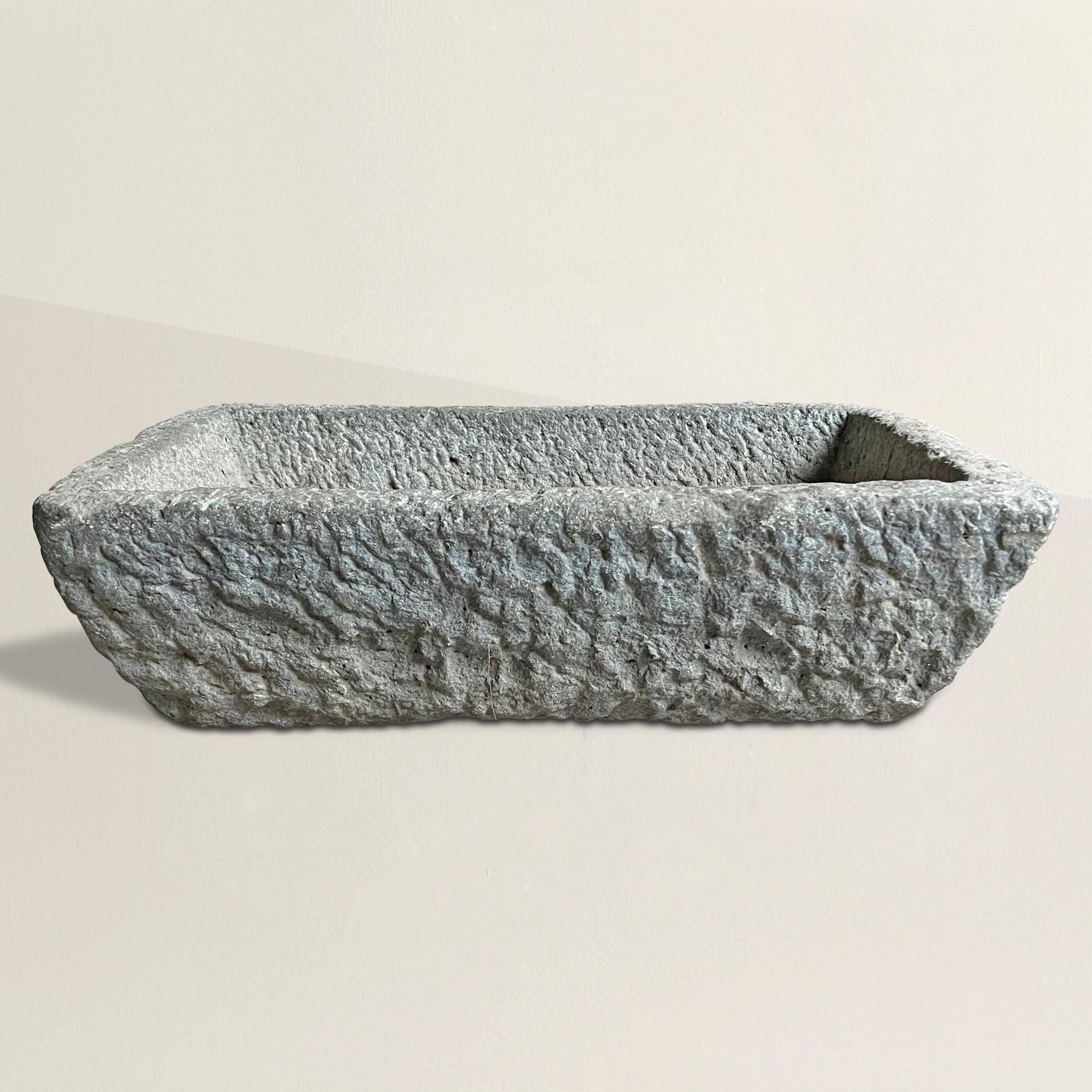 A simple yet chic 20th century hand carved granite planter with the most wonderful rough-hewn surface. Perfect for planting your favorite annuals or herbs to keep on your patio, or placed somewhere special in your garden.