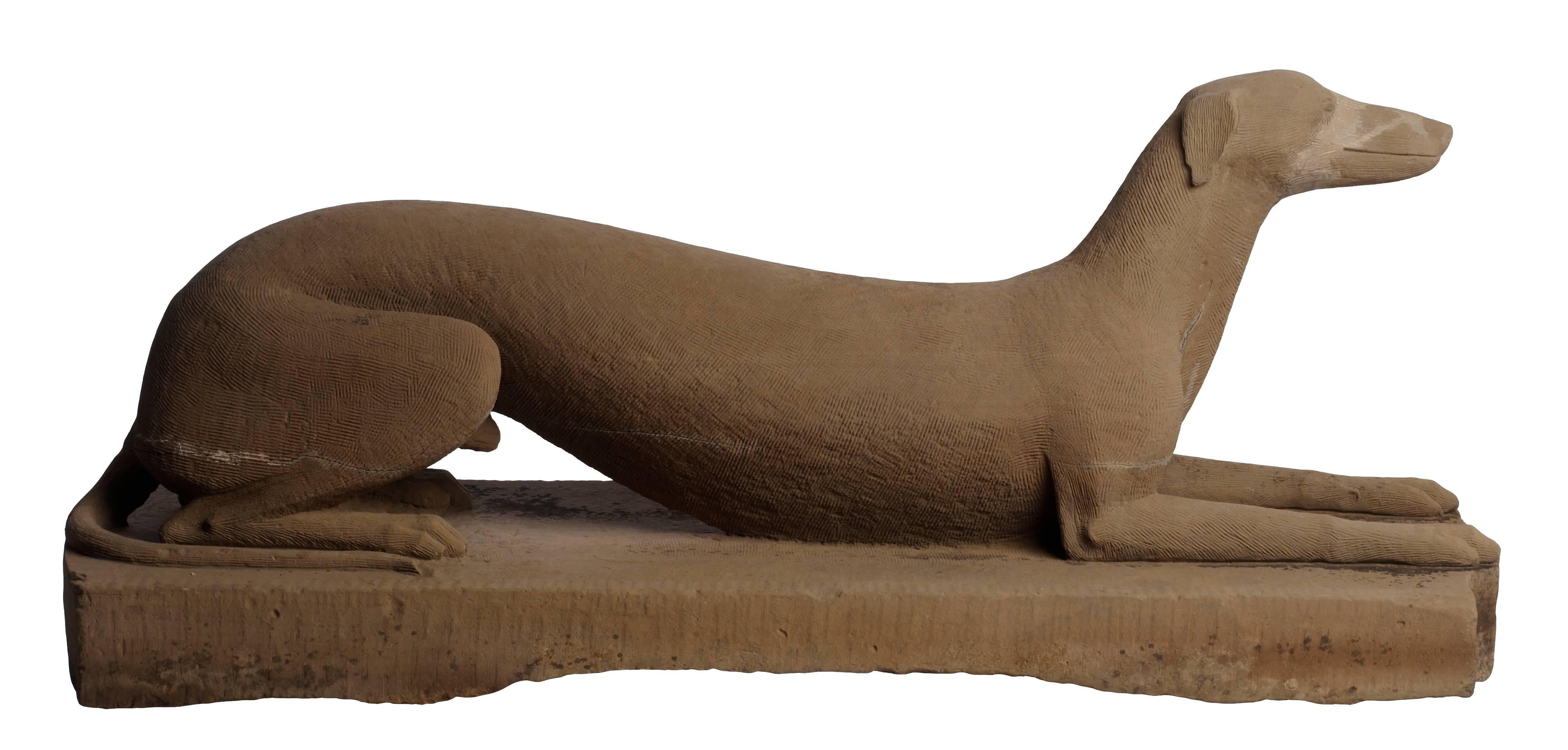Sleek portrait of a Greyhound carved from sandstone in the mid-19th century. Descended in the Farmer family of Portsmouth, Ohio and believed to have been carved by an ancestor who arrived there from Virginia in the mid- 19th century. Originally