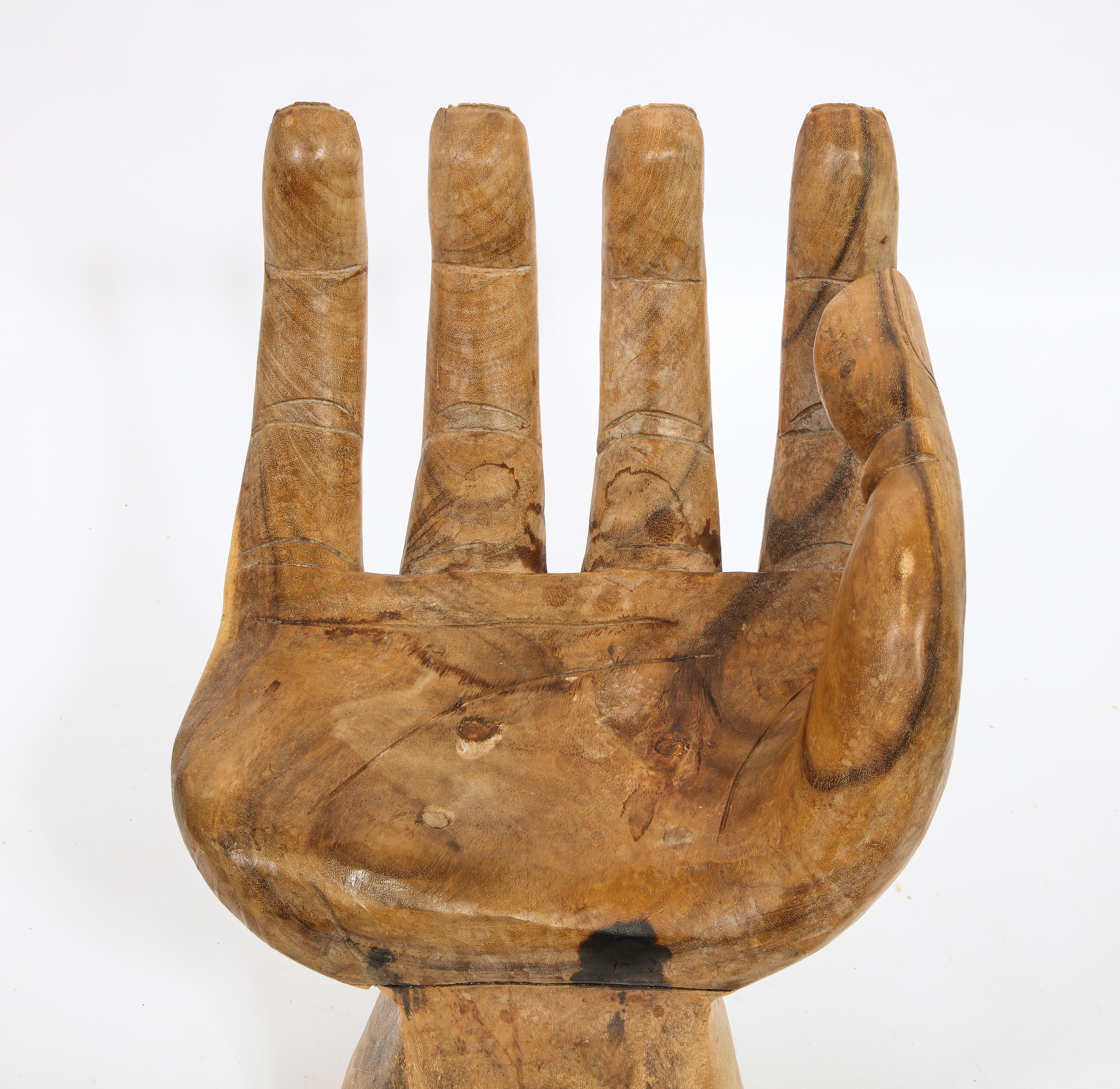 Carved hand stool in the manner of Pedro Friedberg. 3 sizes are available. This is the medium one.