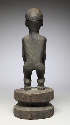 Carved Hardwood Philippine Standing Bulul Figure with Cap, Hands on Knees