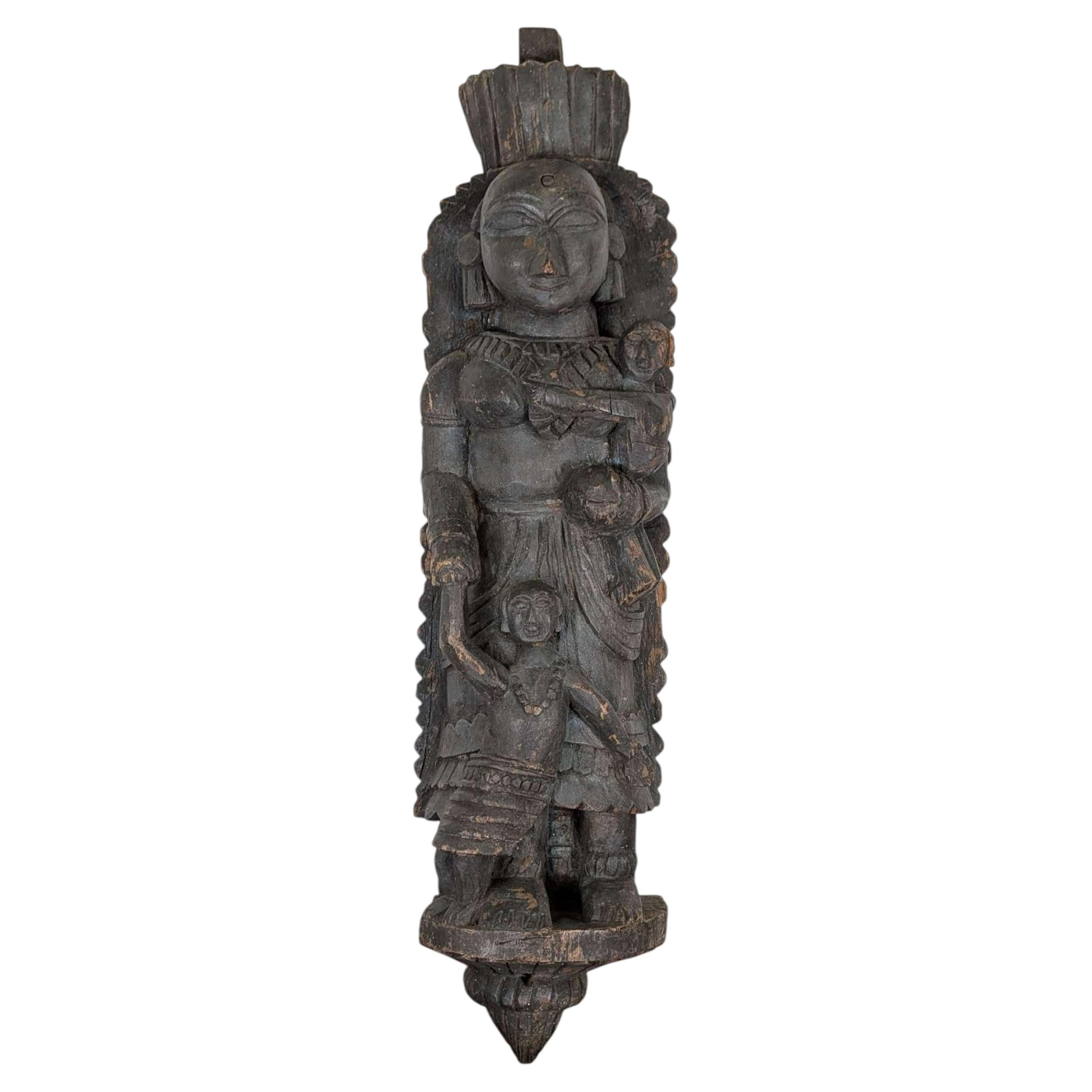 Carved Indian Folk Wood Panel Sculpture of Parvati and Her Sons For Sale