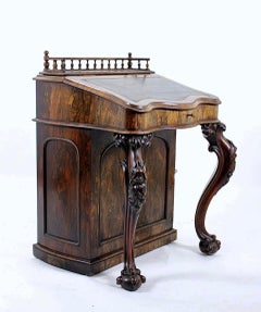 Carved Irish Rosewood and Leather Rise and Fall Davenport, circa 1850