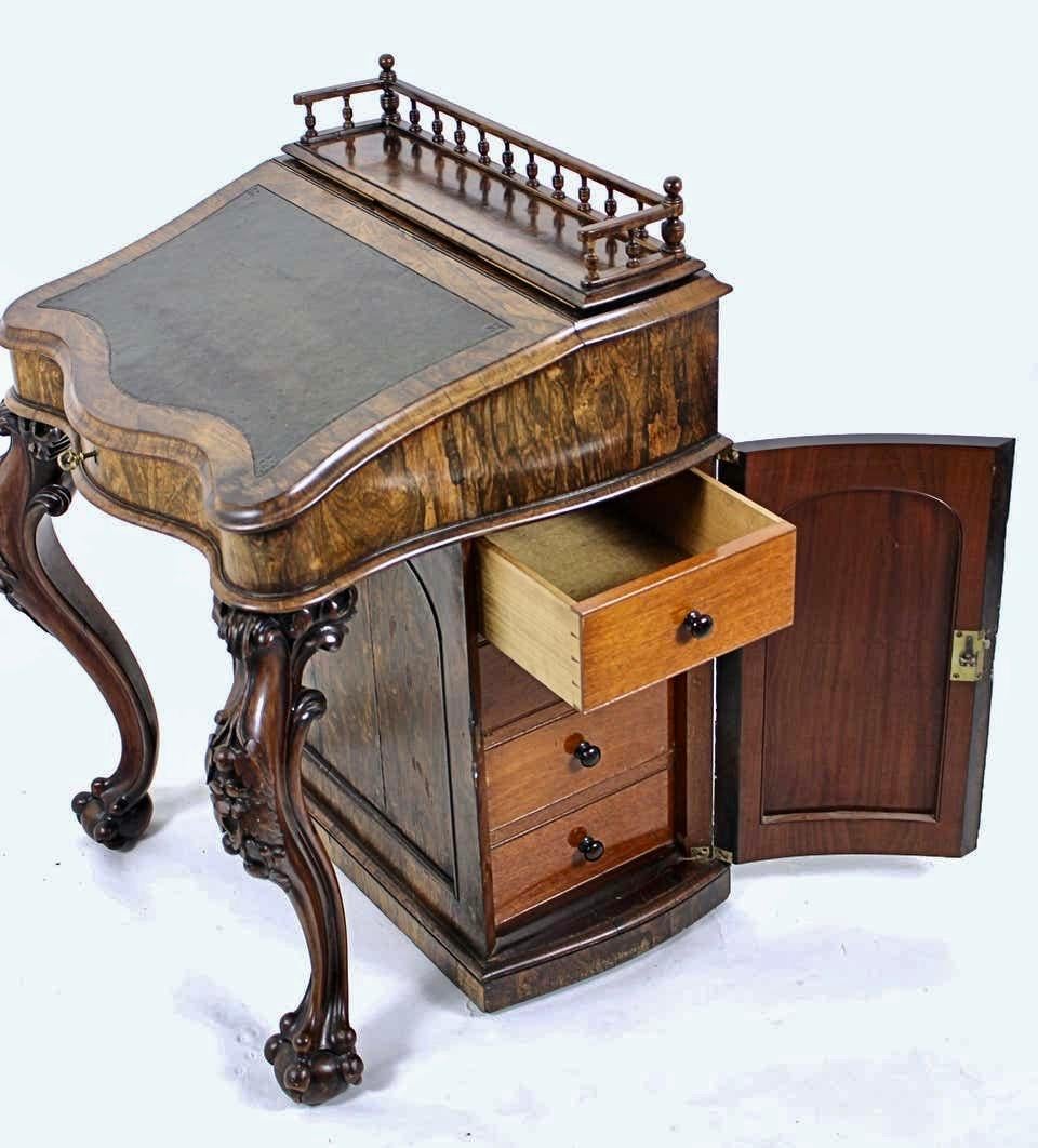 Carved Irish Rosewood and Leather Rise and Fall Davenport, circa 1850 For Sale 1