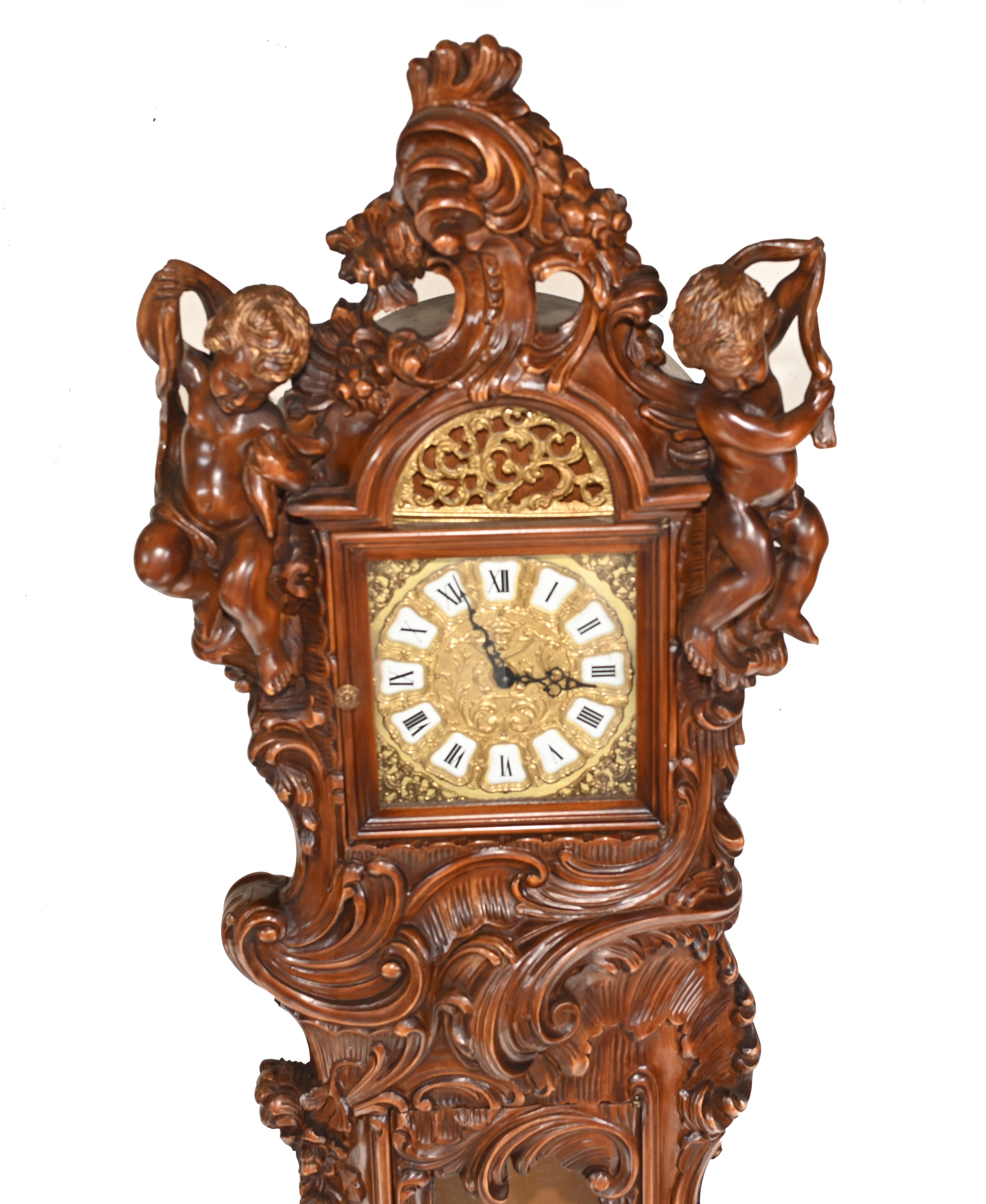Elegant Italian antique grandfather clock in walnut
Proffusely carved with variouis motifs and cherubs
The workmanship is superb, definitely the work of a skilled carver
We date the clock to circa 1890
Some of our items are in storage so please
