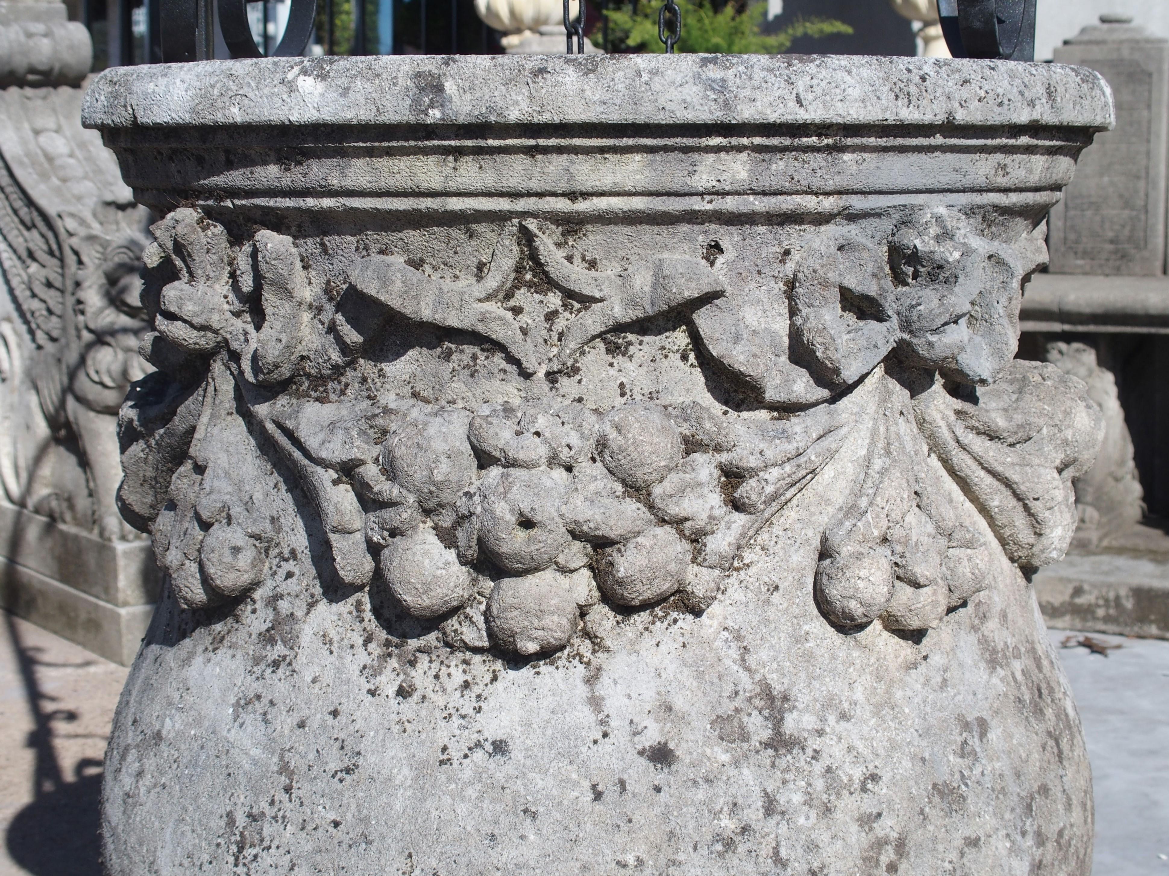Carved Italian Limestone Well with Iron Overthrow In Good Condition In Dallas, TX