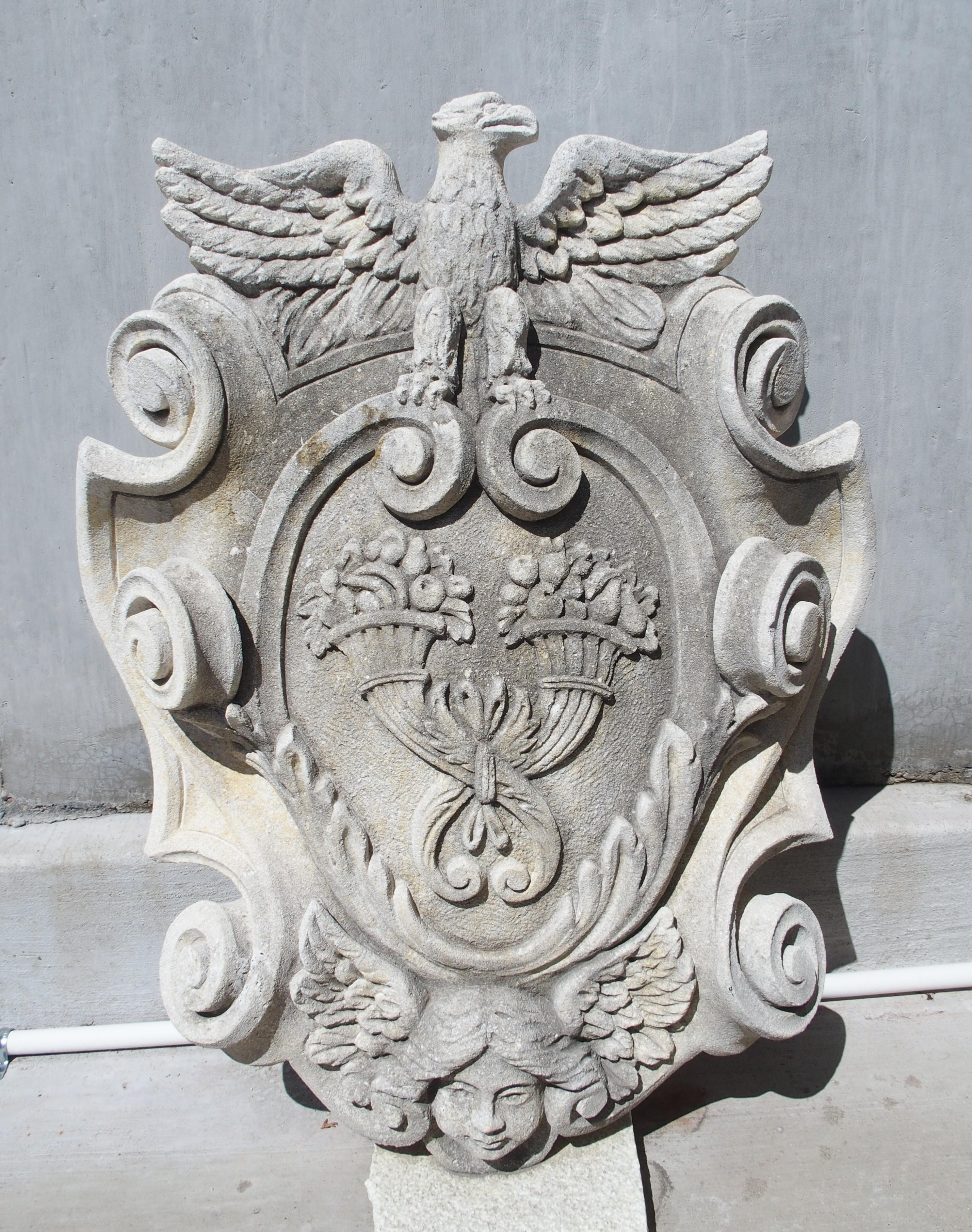 Limestone Carved Italian Stemma Plaque with Cornucopias, Eagle, and Winged Angel For Sale